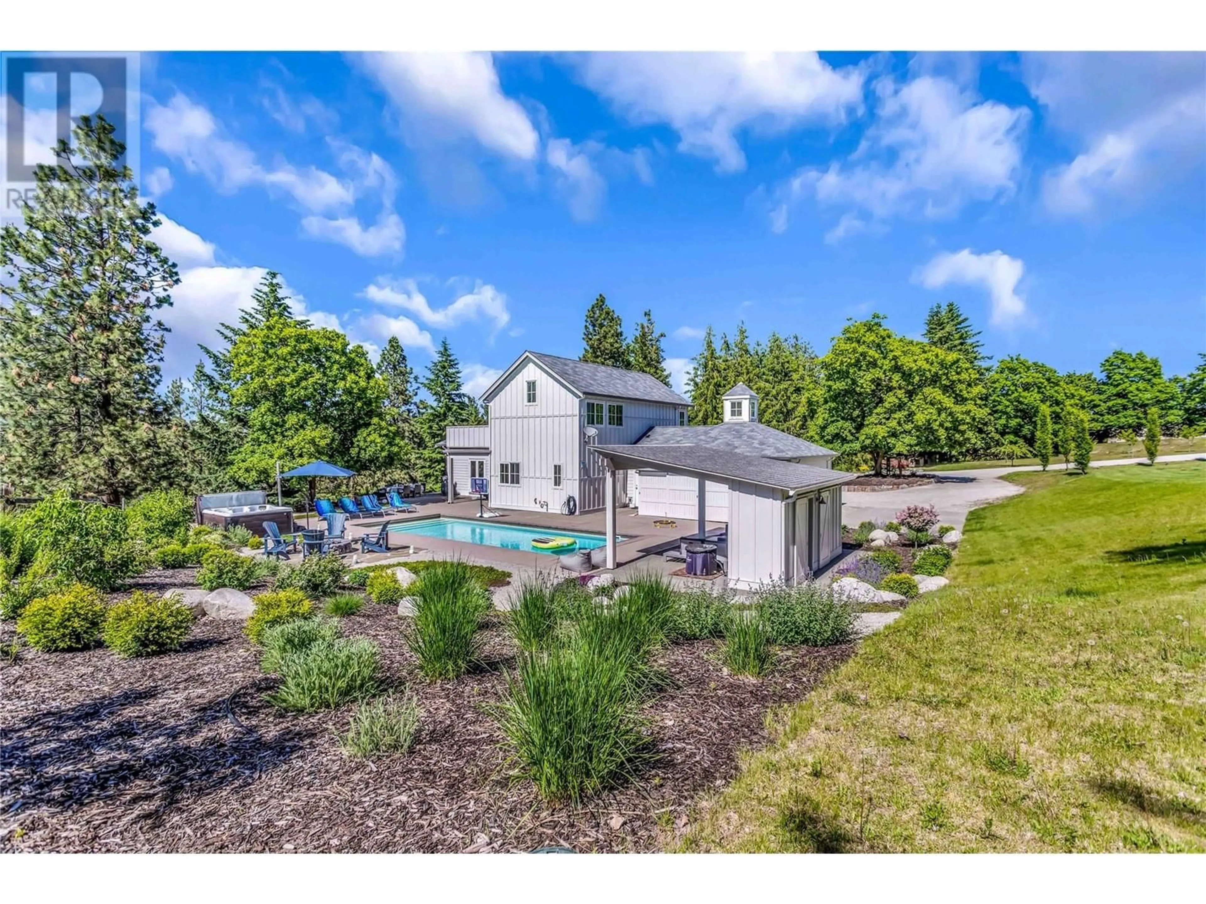 A pic from outside/outdoor area/front of a property/back of a property/a pic from drone, water/lake/river/ocean view for 2376 SAUCIER ROAD, Kelowna British Columbia V1W4B8