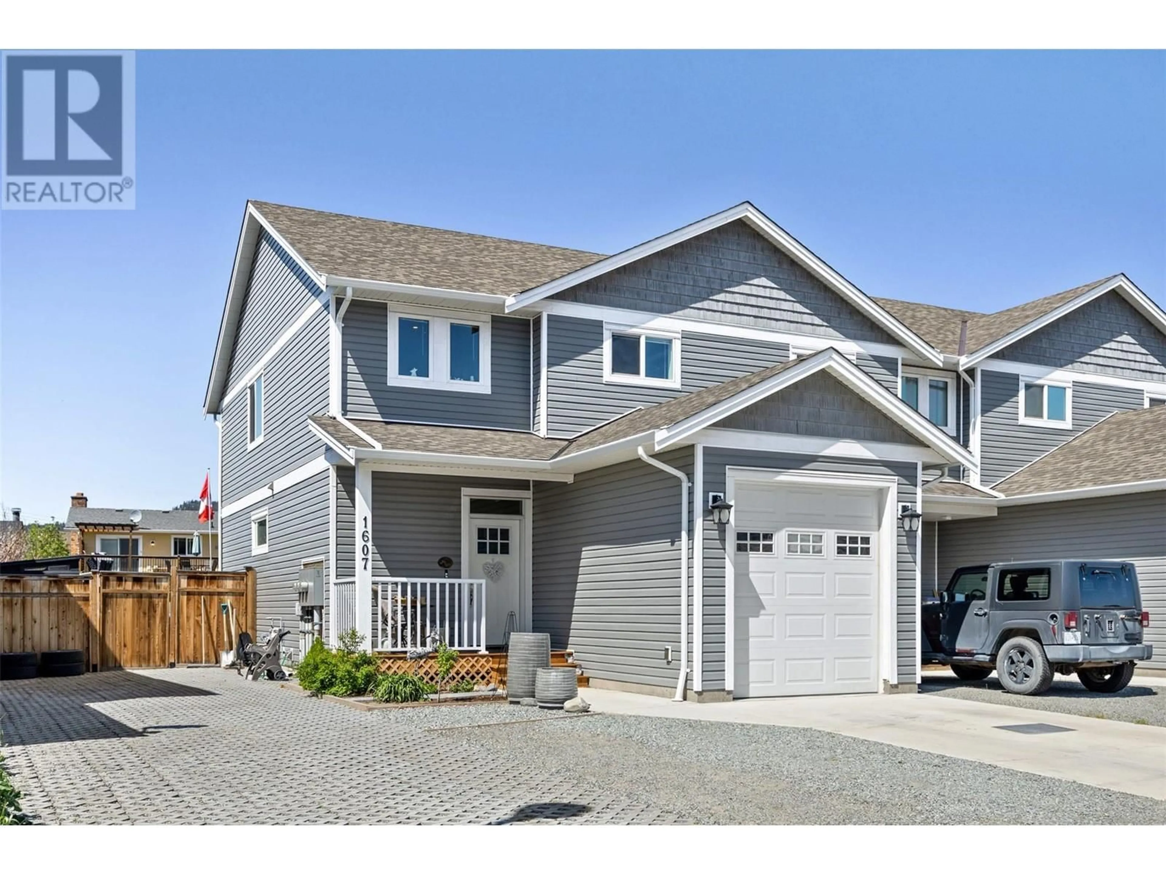 Home with vinyl exterior material, street for 1607 PHILLIPS STREET, Merritt British Columbia V1K0B8