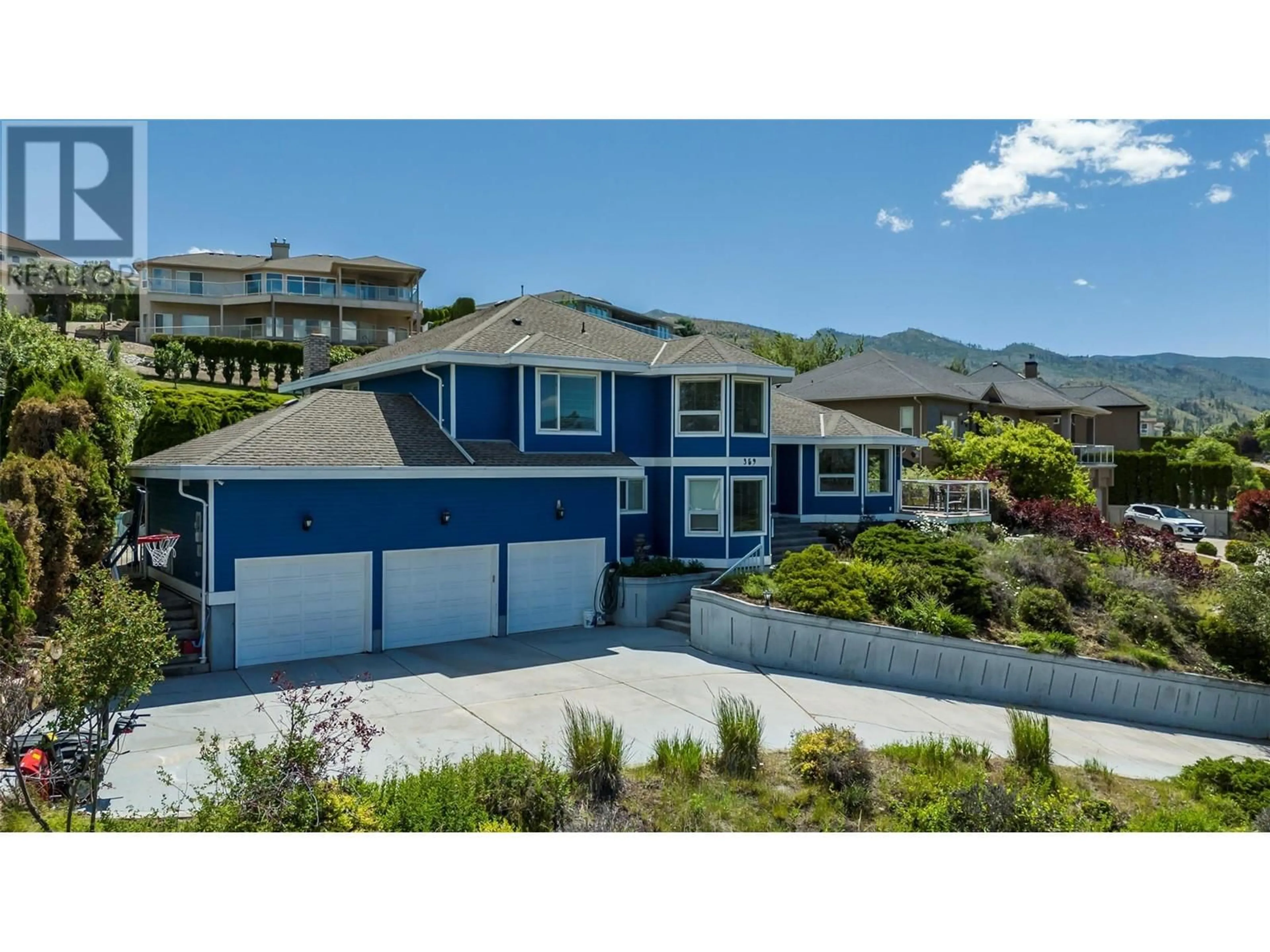 A pic from outside/outdoor area/front of a property/back of a property/a pic from drone, unknown for 359 STELLAR DRIVE, Kelowna British Columbia V1W4K4