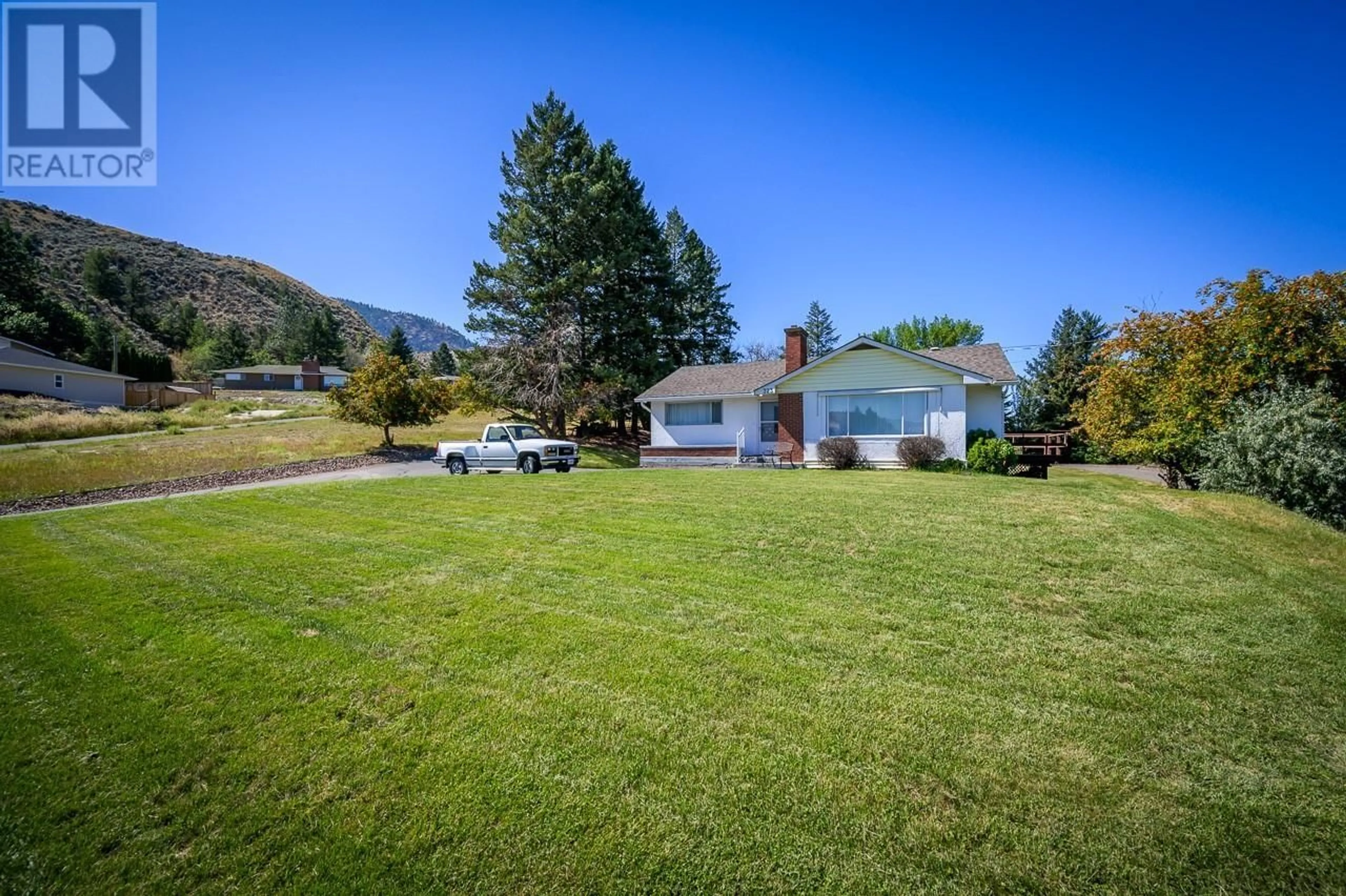 A pic from outside/outdoor area/front of a property/back of a property/a pic from drone, mountain view for 323 RIDGE ROAD, Kamloops British Columbia V2C4Y9