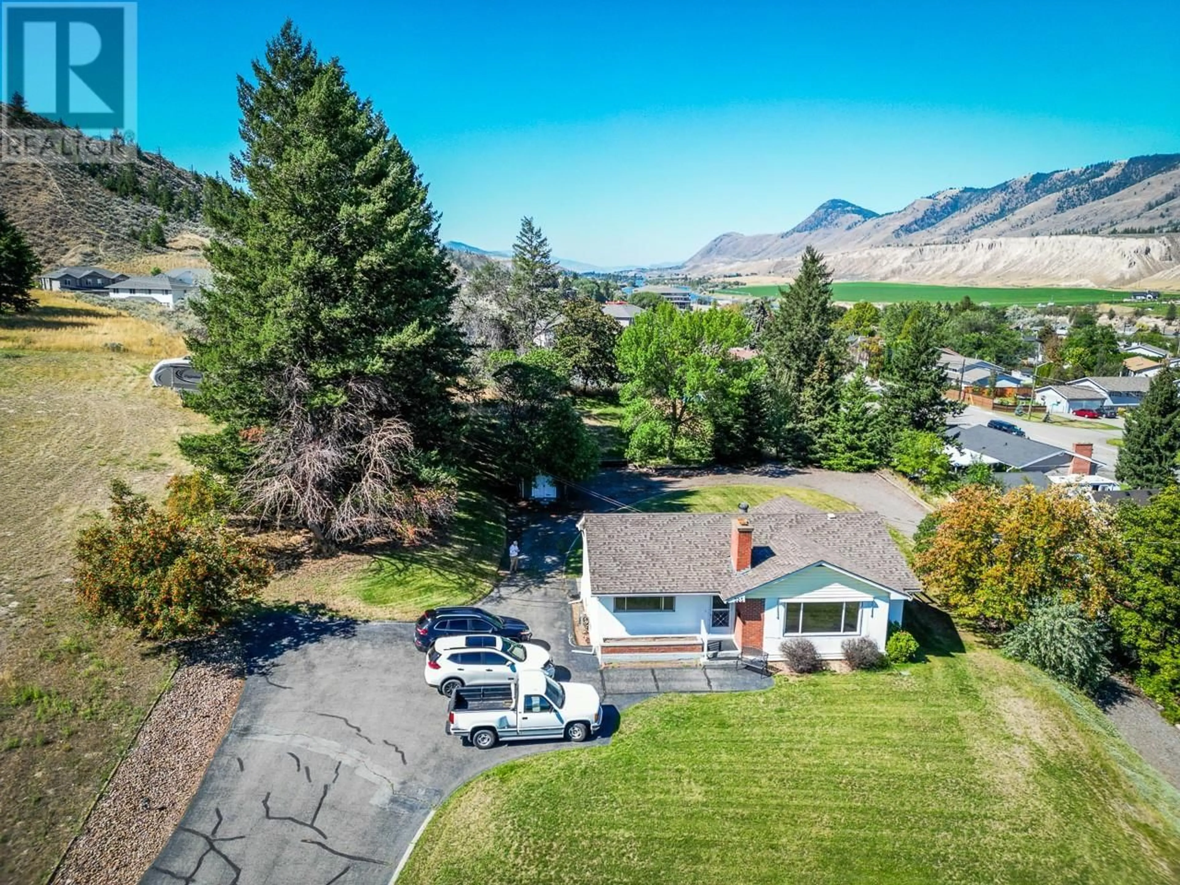 A pic from outside/outdoor area/front of a property/back of a property/a pic from drone, mountain view for 323 RIDGE ROAD, Kamloops British Columbia V2C4Y9