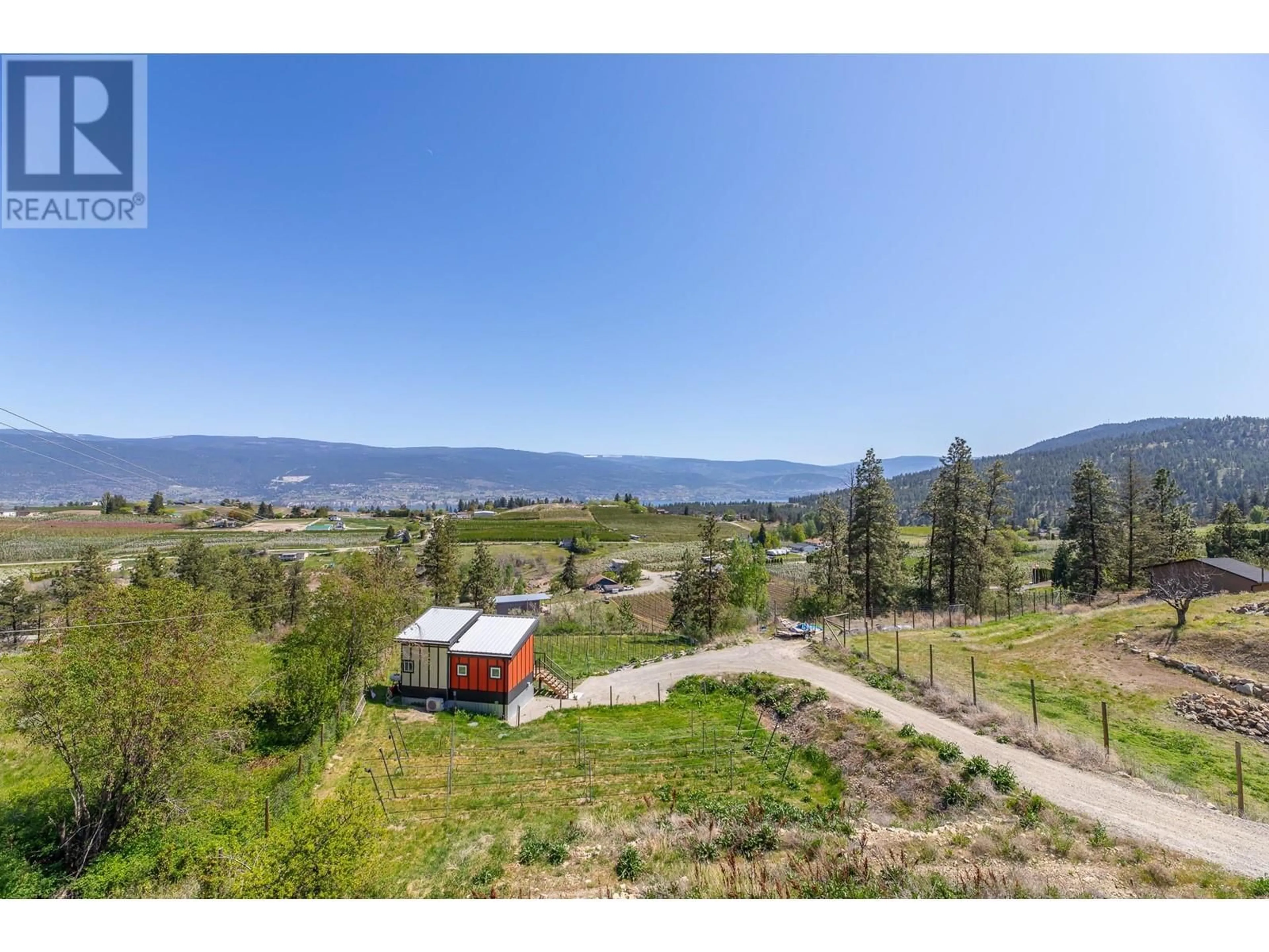 A pic from outside/outdoor area/front of a property/back of a property/a pic from drone, mountain view for 9003 GILMAN ROAD, Summerland British Columbia V0H1Z2