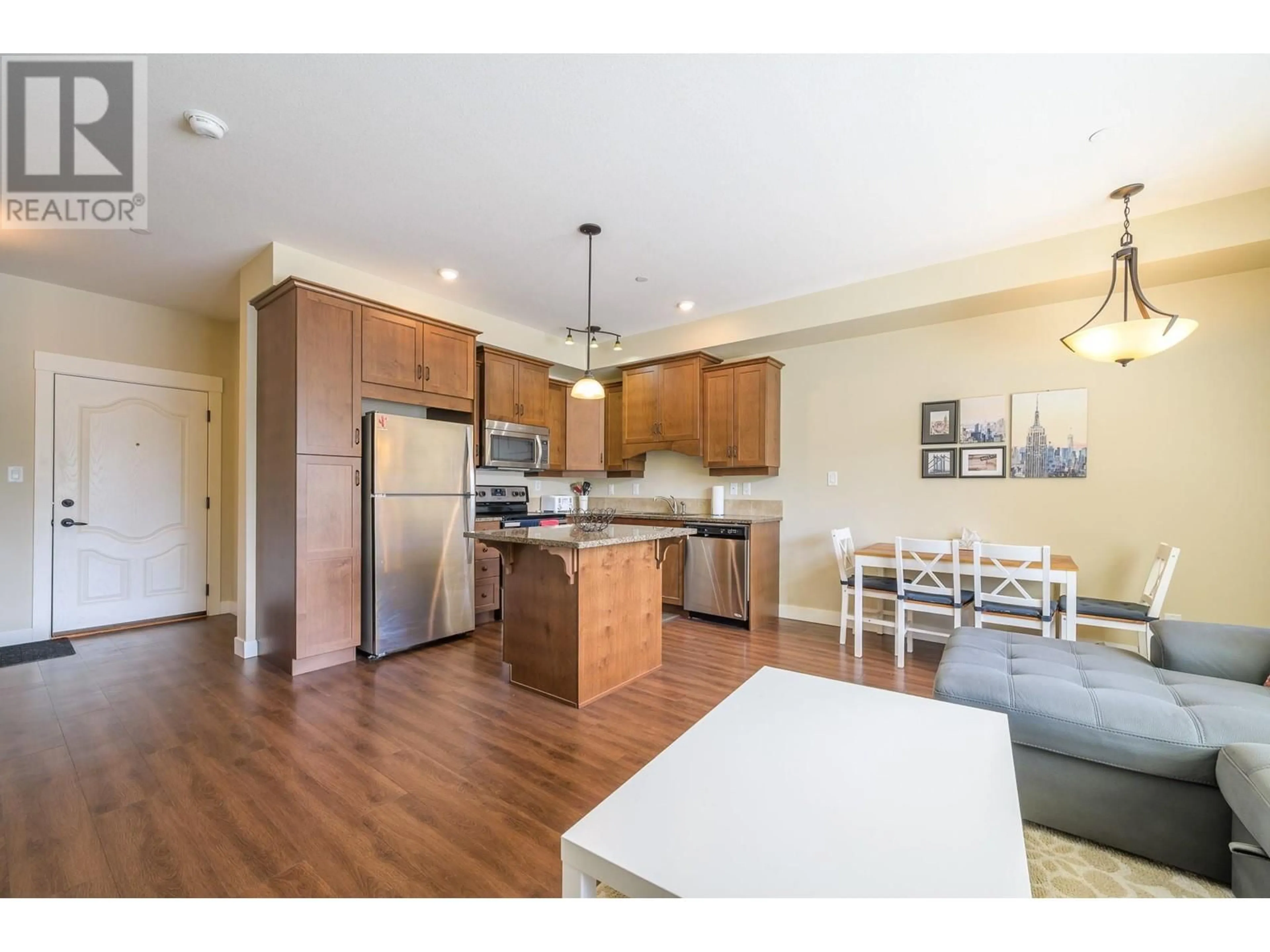 Open concept kitchen, wood/laminate floor for 302 - 755 MCGILL ROAD, Kamloops British Columbia V2C0B6