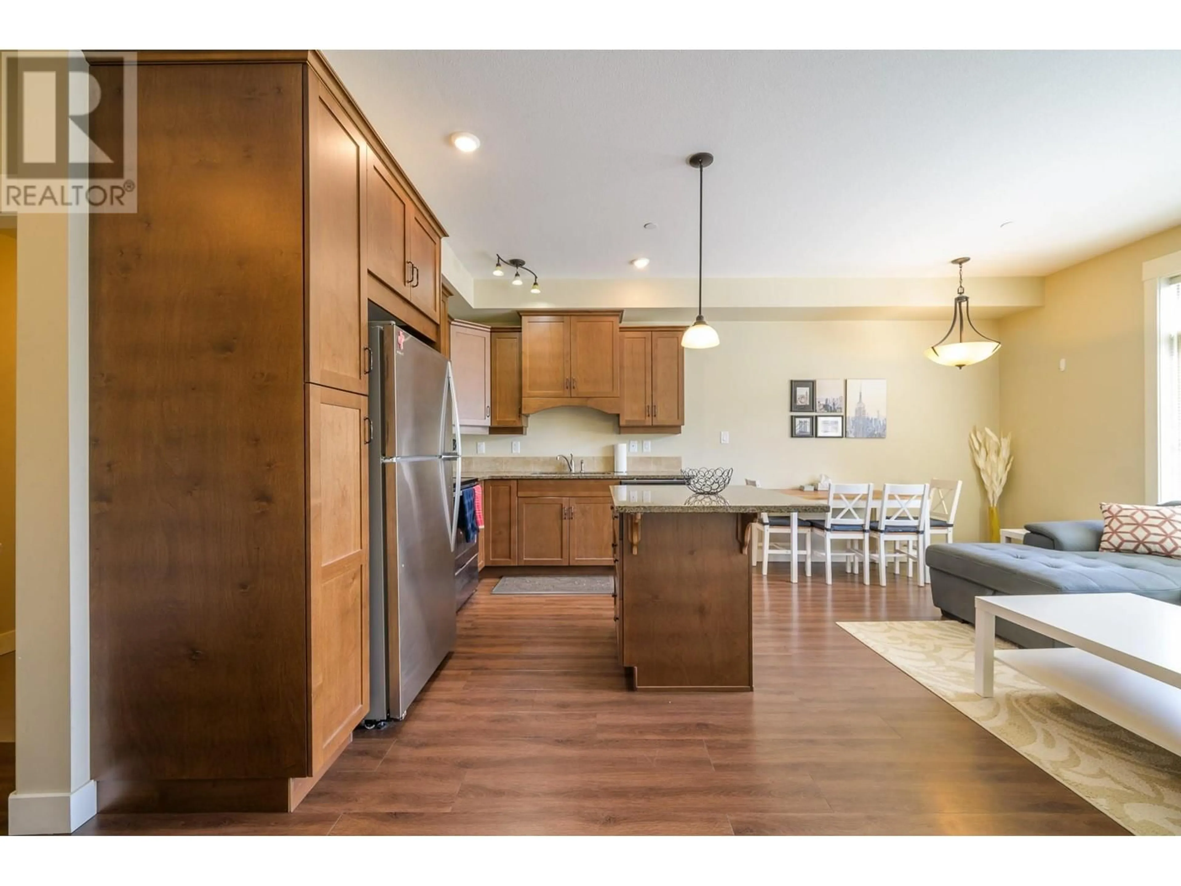 Open concept kitchen, wood/laminate floor for 302 - 755 MCGILL ROAD, Kamloops British Columbia V2C0B6