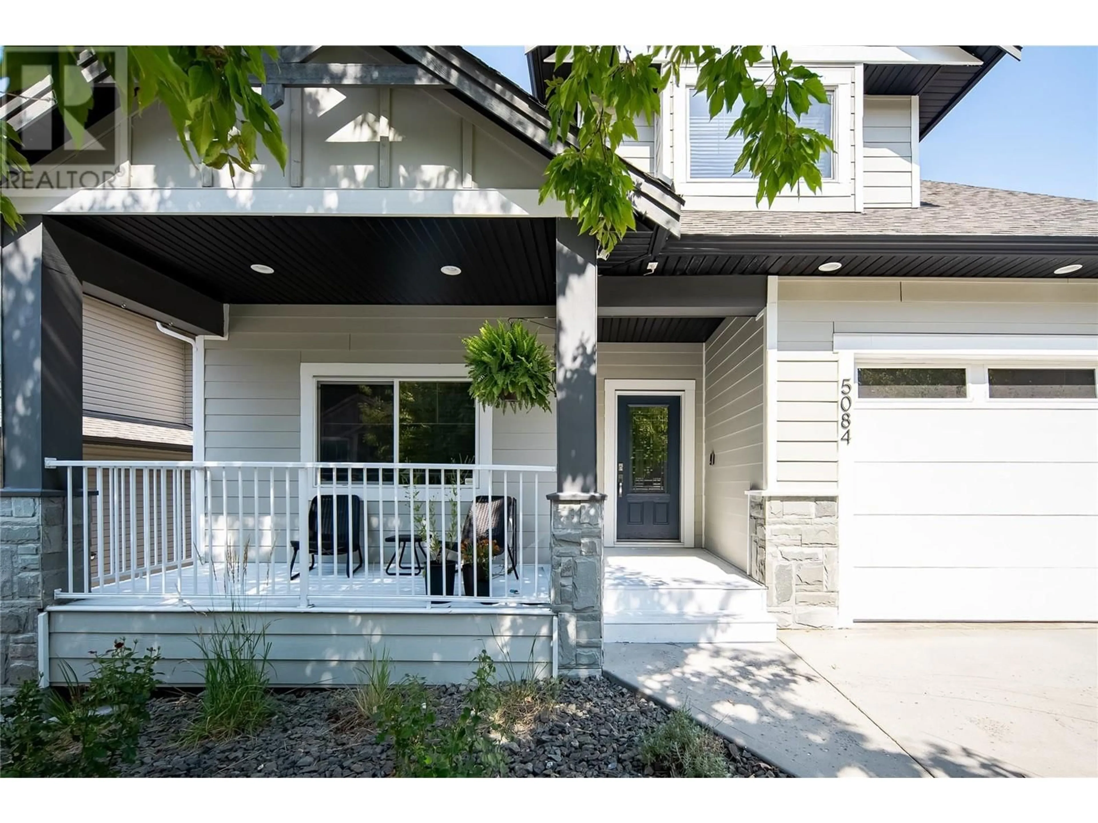 Home with vinyl exterior material, street for 5084 SEON CRESCENT, Kelowna British Columbia V1W5G8