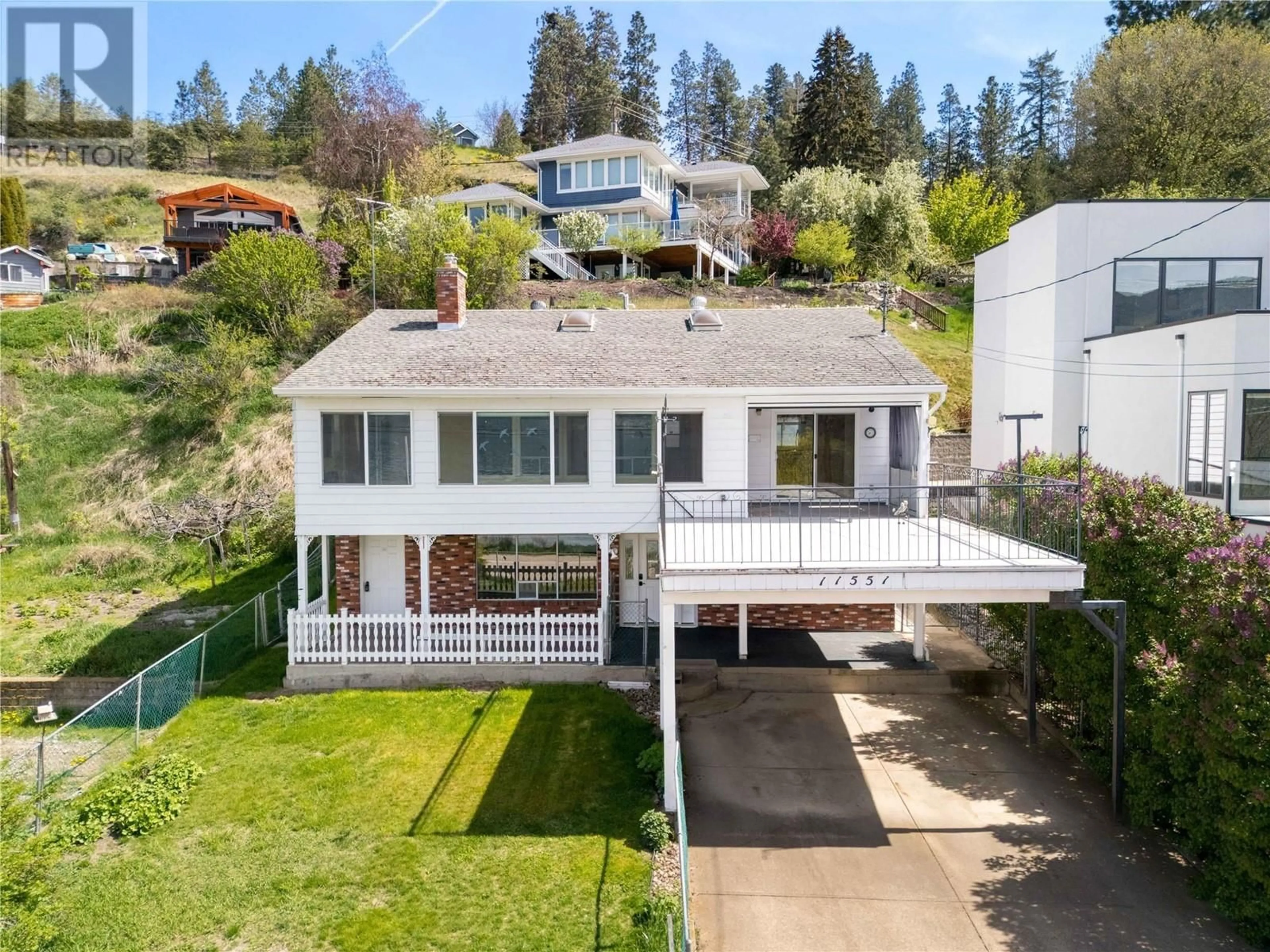 A pic from outside/outdoor area/front of a property/back of a property/a pic from drone, unknown for 11551 OKANAGAN CENTRE ROAD WEST, Lake Country British Columbia V4V2H2