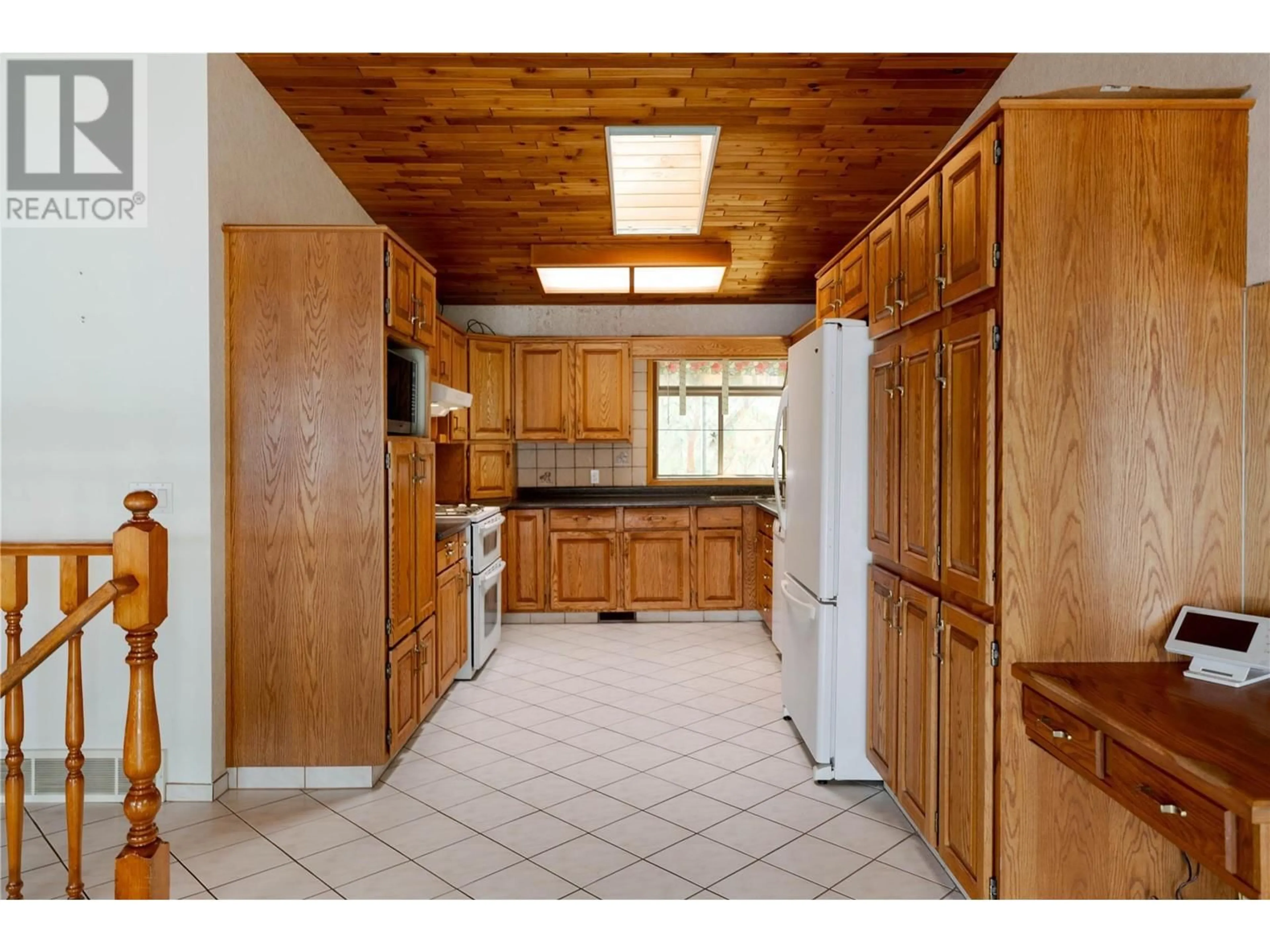 Standard kitchen, ceramic/tile floor for 11551 OKANAGAN CENTRE ROAD WEST, Lake Country British Columbia V4V2H2