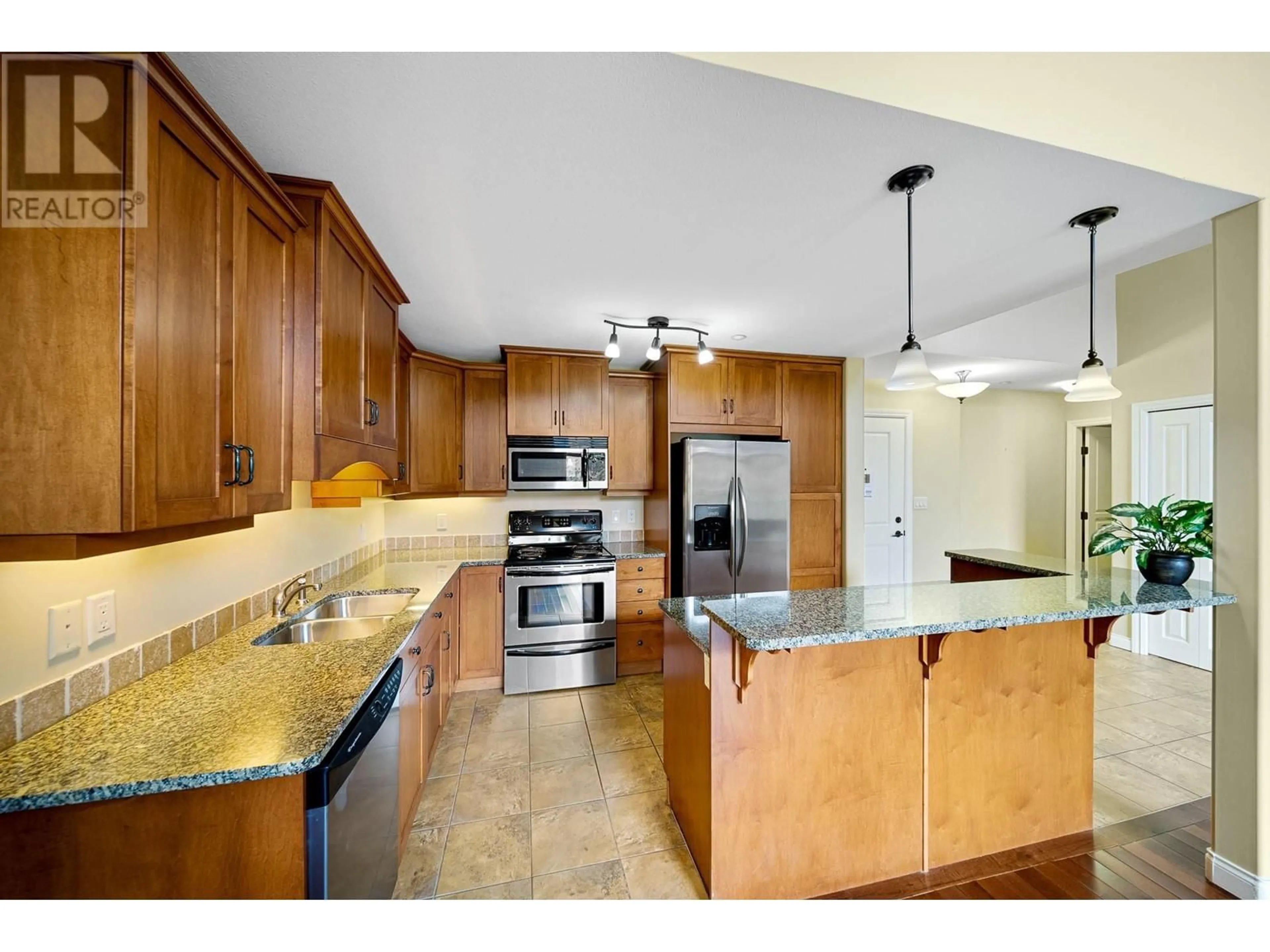 Open concept kitchen, ceramic/tile floor for 307 - 1390 HILLSIDE DRIVE, Kamloops British Columbia V2E0A6