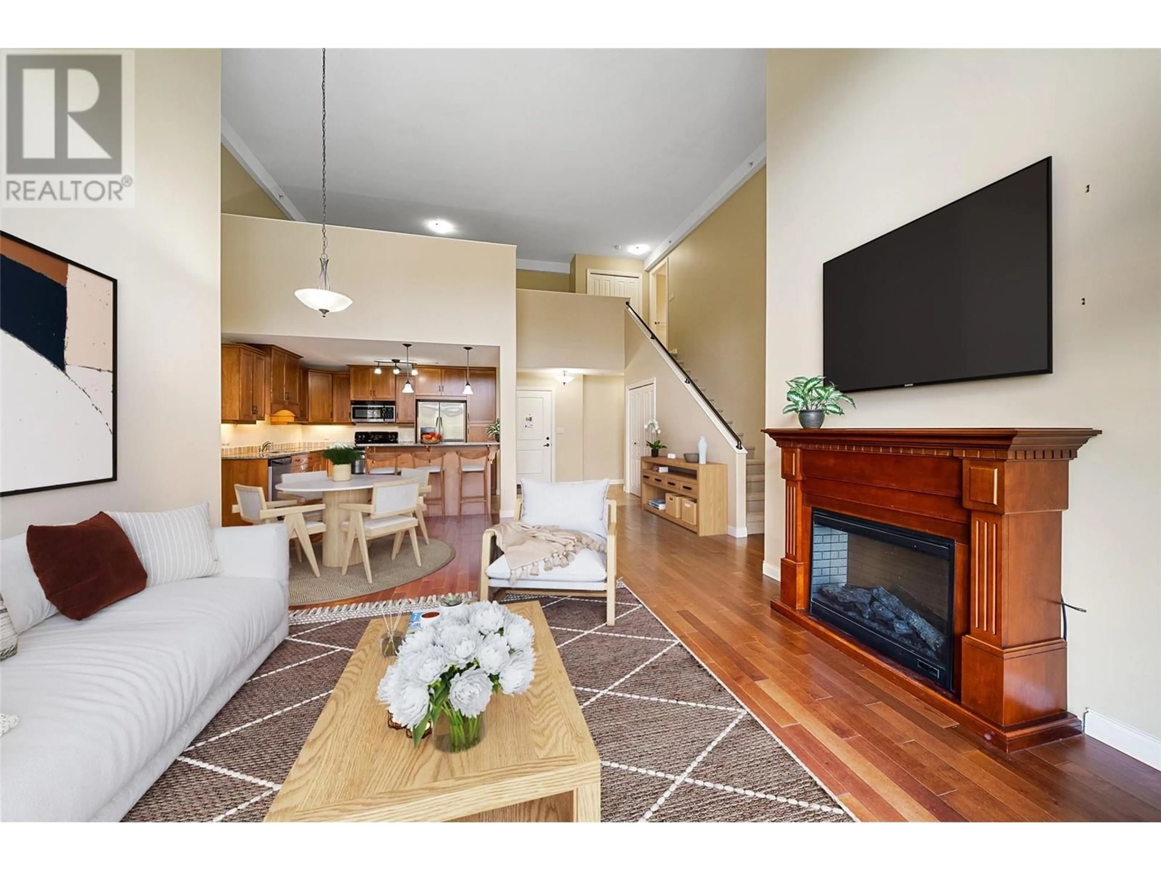 Living room with furniture, wood/laminate floor for 307 - 1390 HILLSIDE DRIVE, Kamloops British Columbia V2E0A6