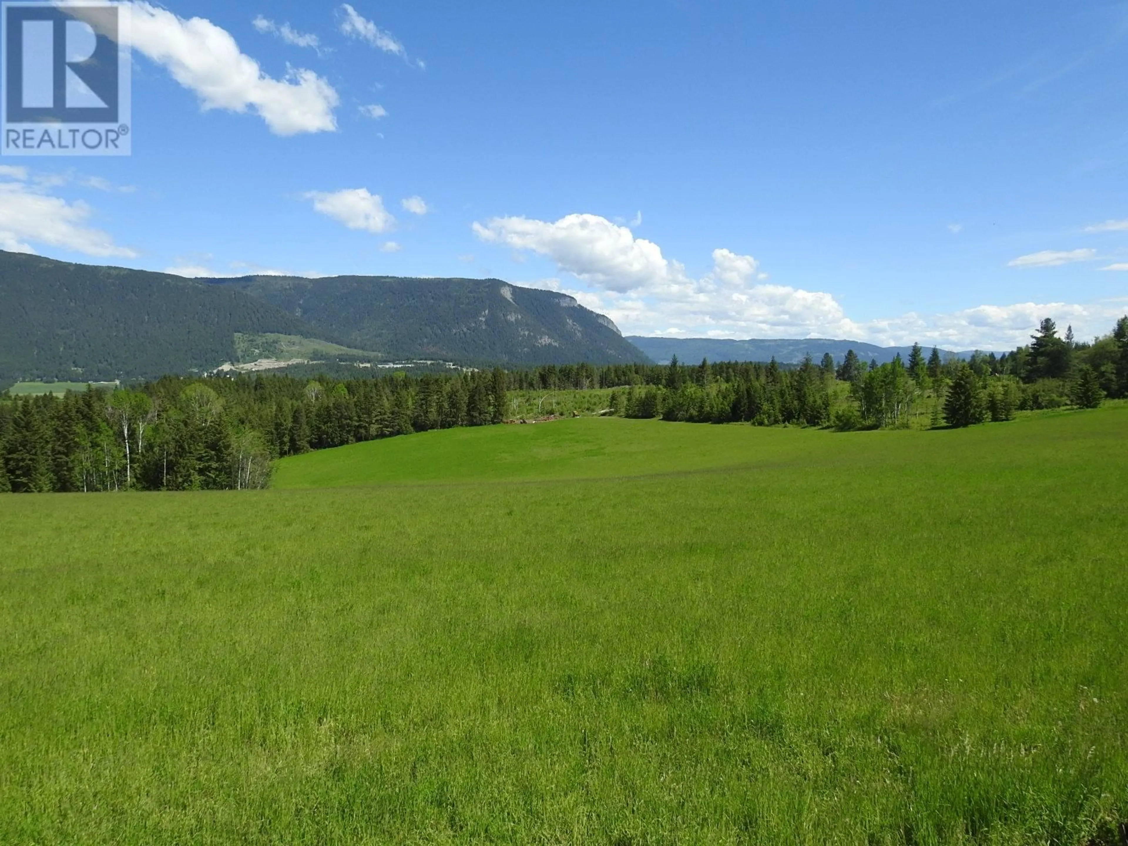 A pic from outside/outdoor area/front of a property/back of a property/a pic from drone, mountain view for 1144 TAPPEN VALLEY ROAD, Tappen British Columbia V0E2X3