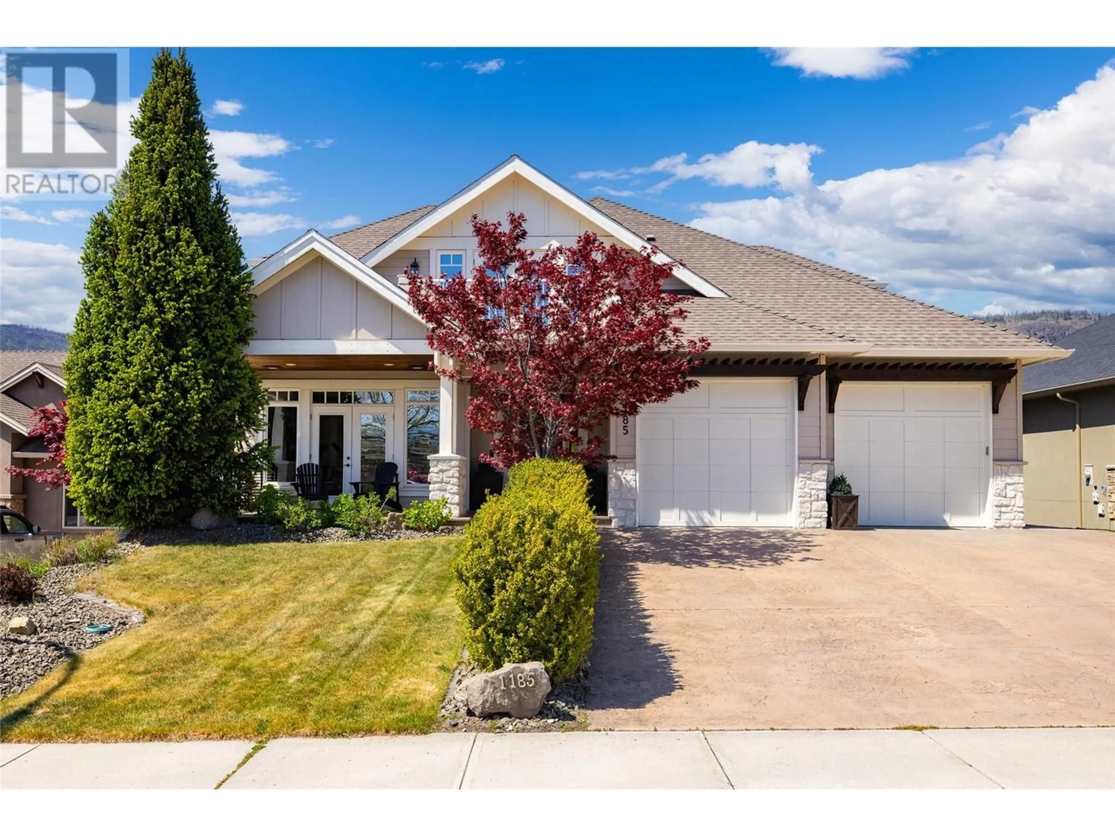 Home with vinyl exterior material, street for 1185 PEAK POINT DRIVE, West Kelowna British Columbia V1Z4A9