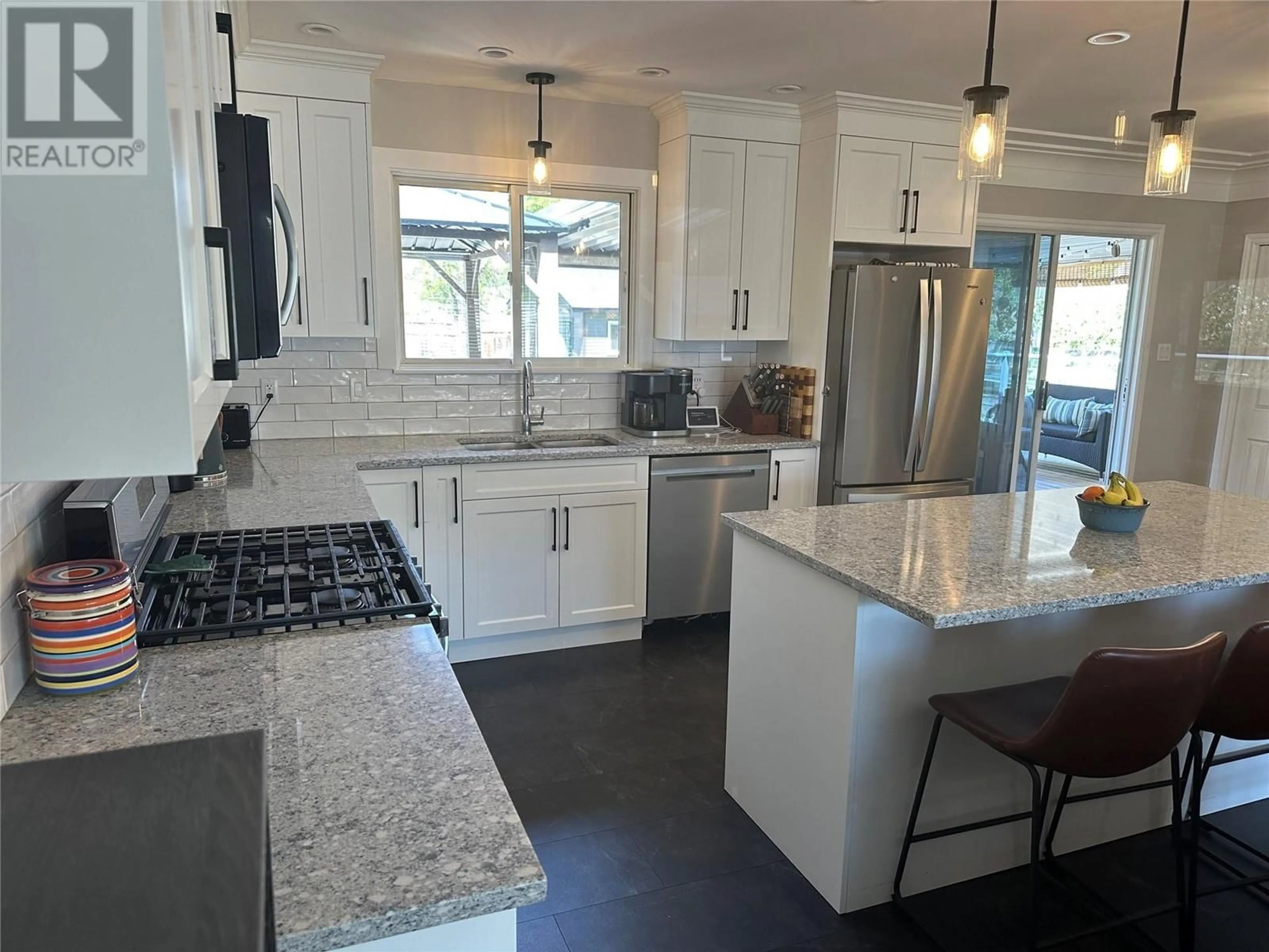 Open concept kitchen, ceramic/tile floor for 1515 DUNCAN AVENUE, Penticton British Columbia V2A2X7