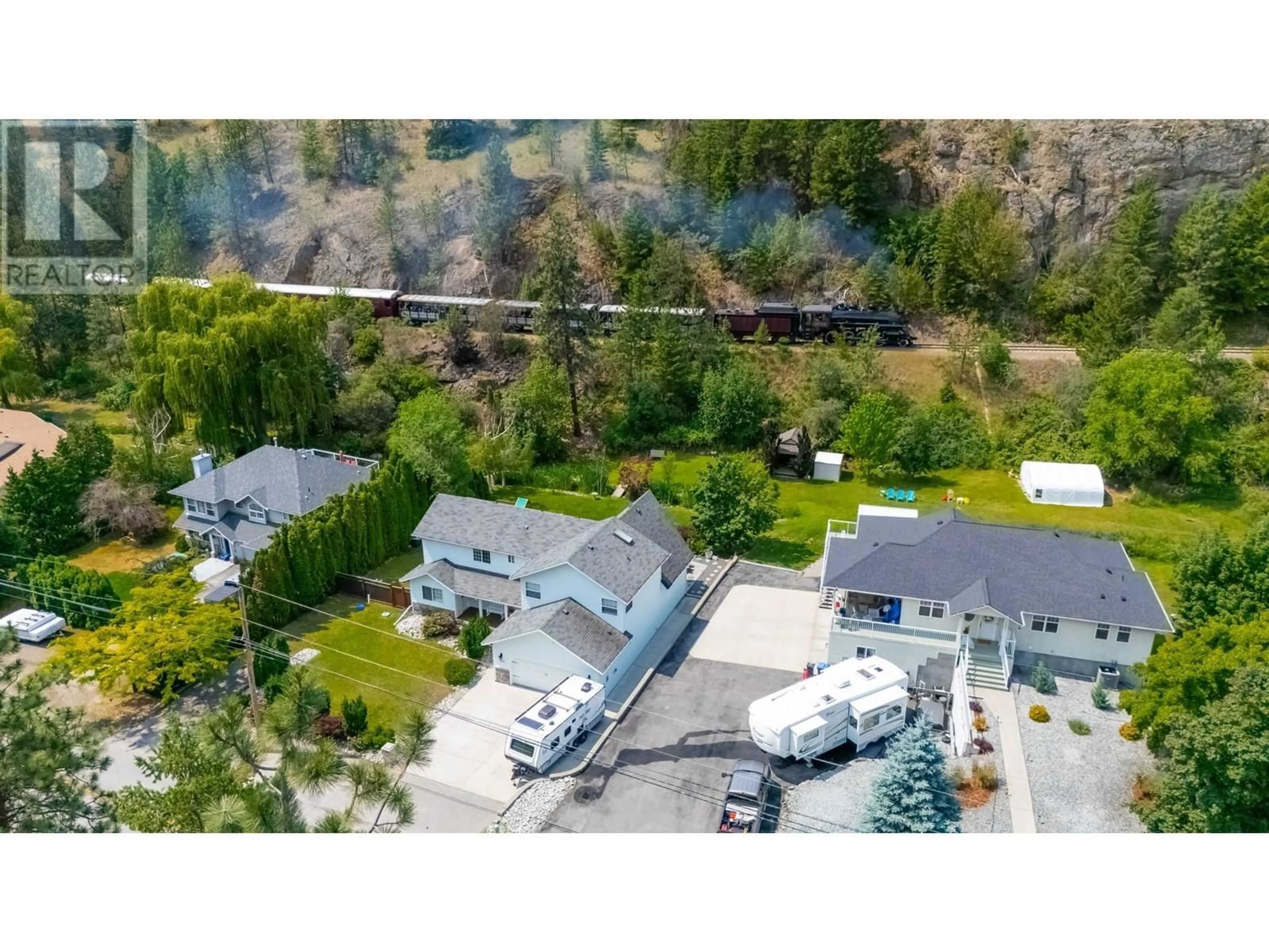 A pic from outside/outdoor area/front of a property/back of a property/a pic from drone, unknown for 7200 VICTORIA ROAD, Summerland British Columbia V0H1Z2