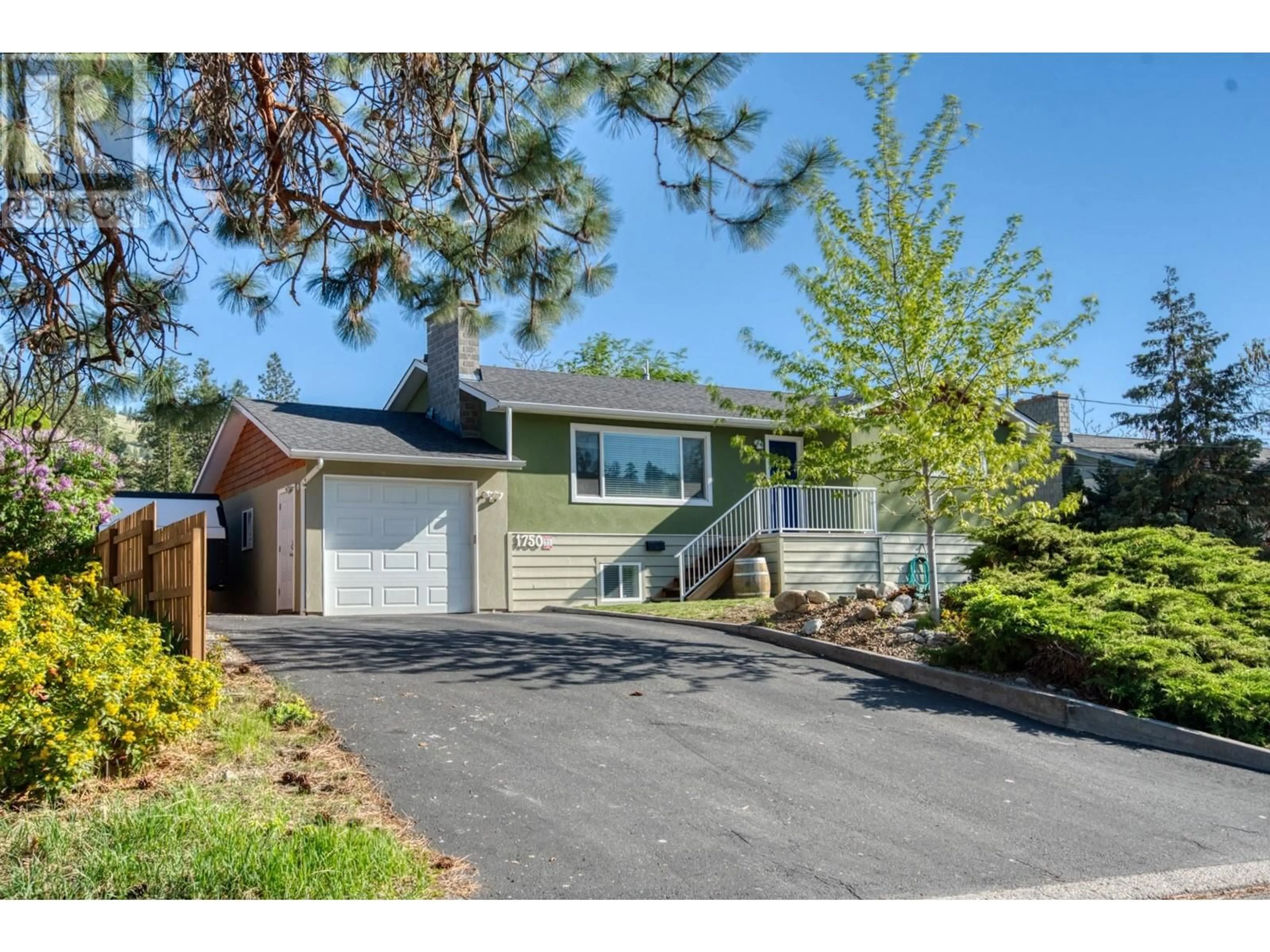 Home with vinyl exterior material, street for 1750 RIDGEDALE AVENUE, Penticton British Columbia V2A2S6