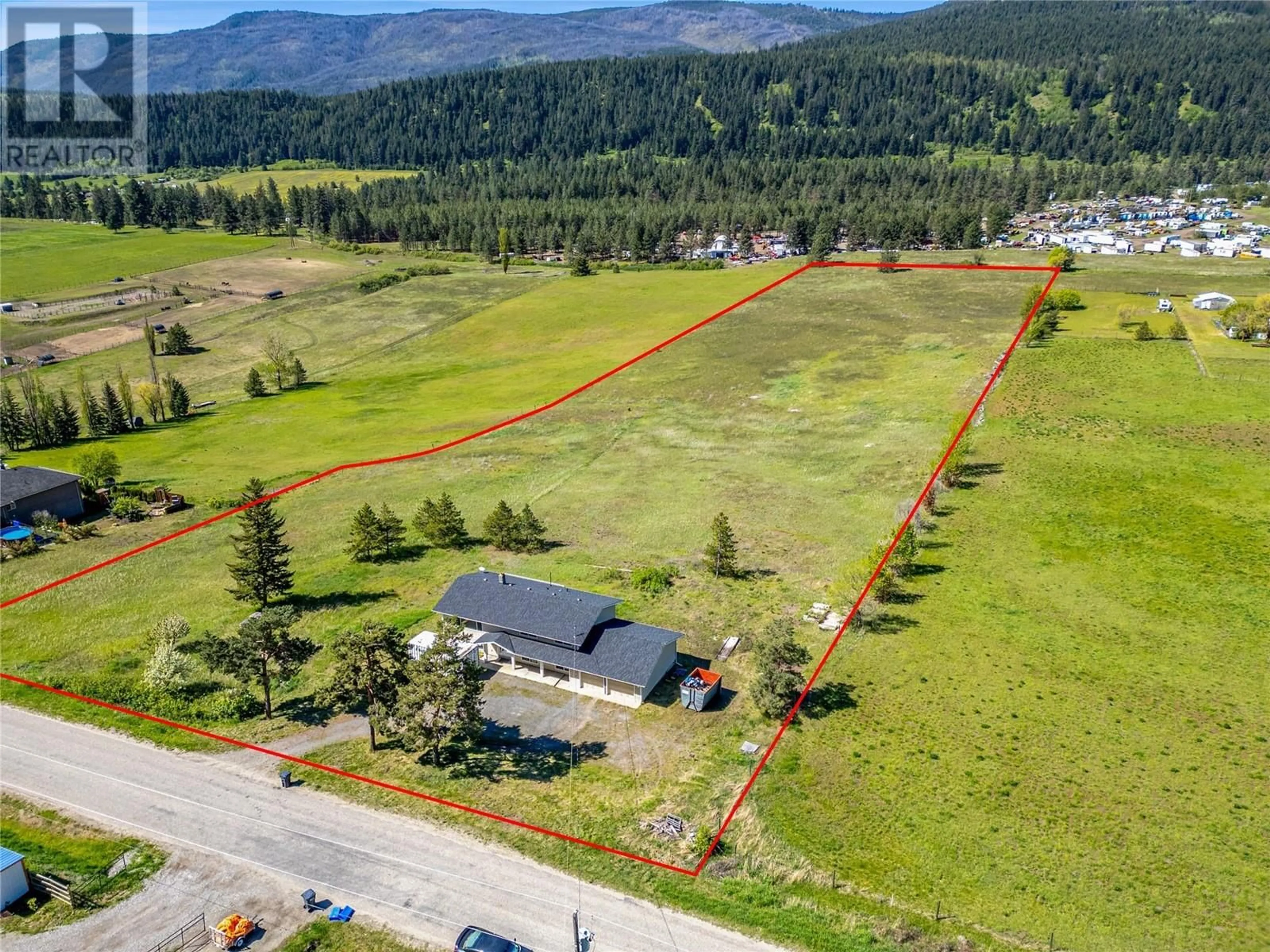 A pic from outside/outdoor area/front of a property/back of a property/a pic from drone, mountain view for 1278 ROUND LAKE ROAD, Armstrong British Columbia V0E1B5