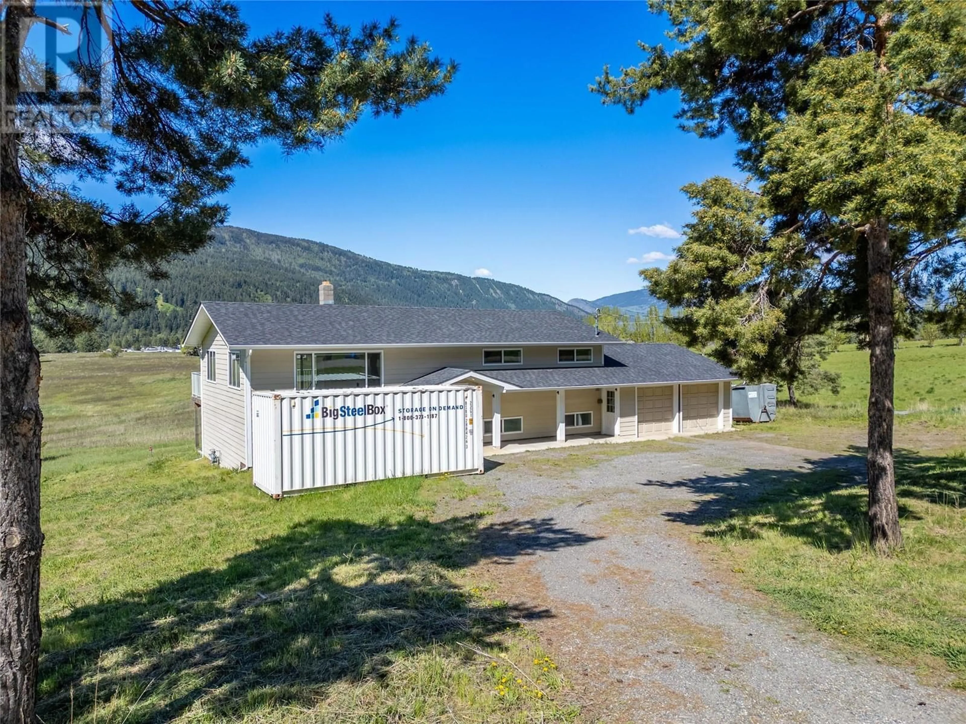 A pic from outside/outdoor area/front of a property/back of a property/a pic from drone, mountain view for 1278 ROUND LAKE ROAD, Armstrong British Columbia V0E1B5