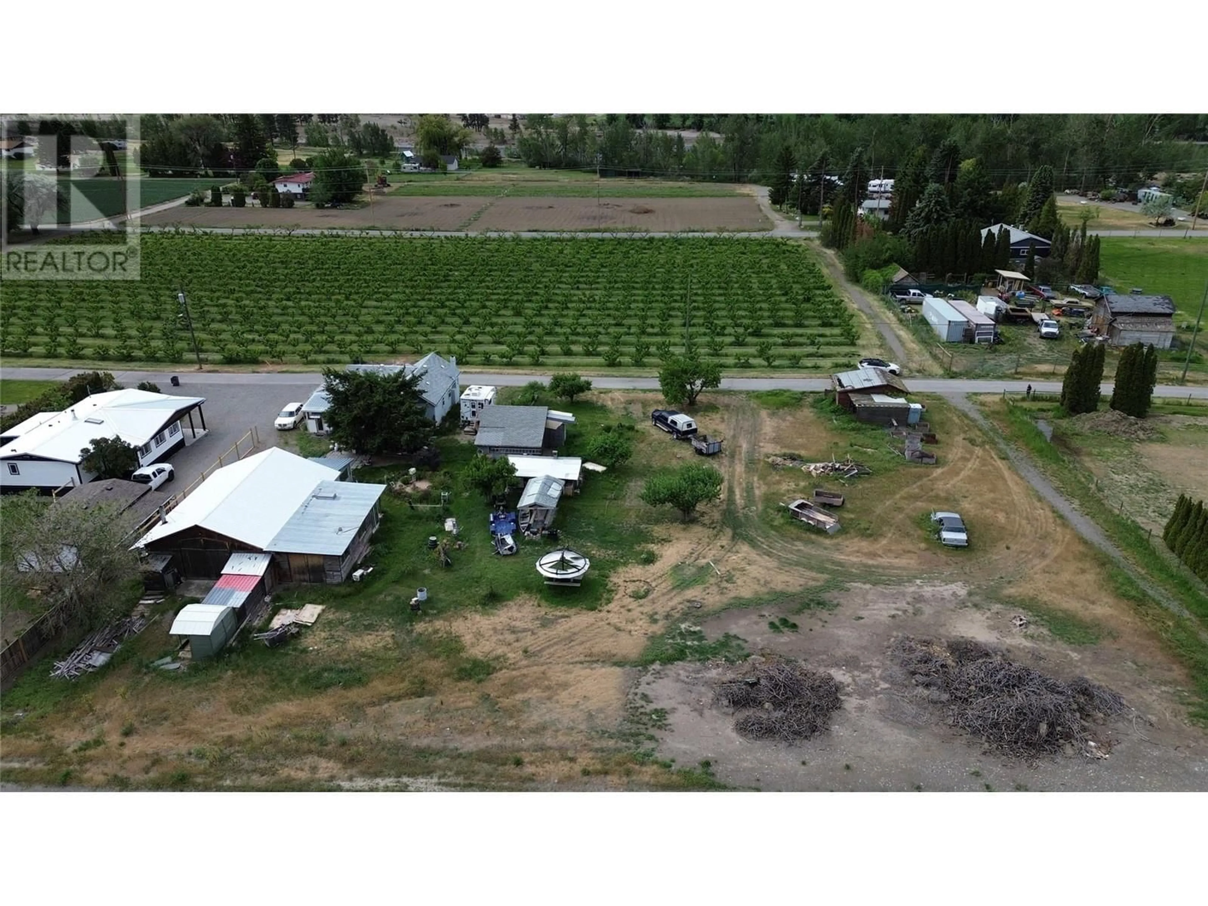 A pic from outside/outdoor area/front of a property/back of a property/a pic from drone, mountain view for 110 9TH AVENUE, Keremeos British Columbia V0X1N3