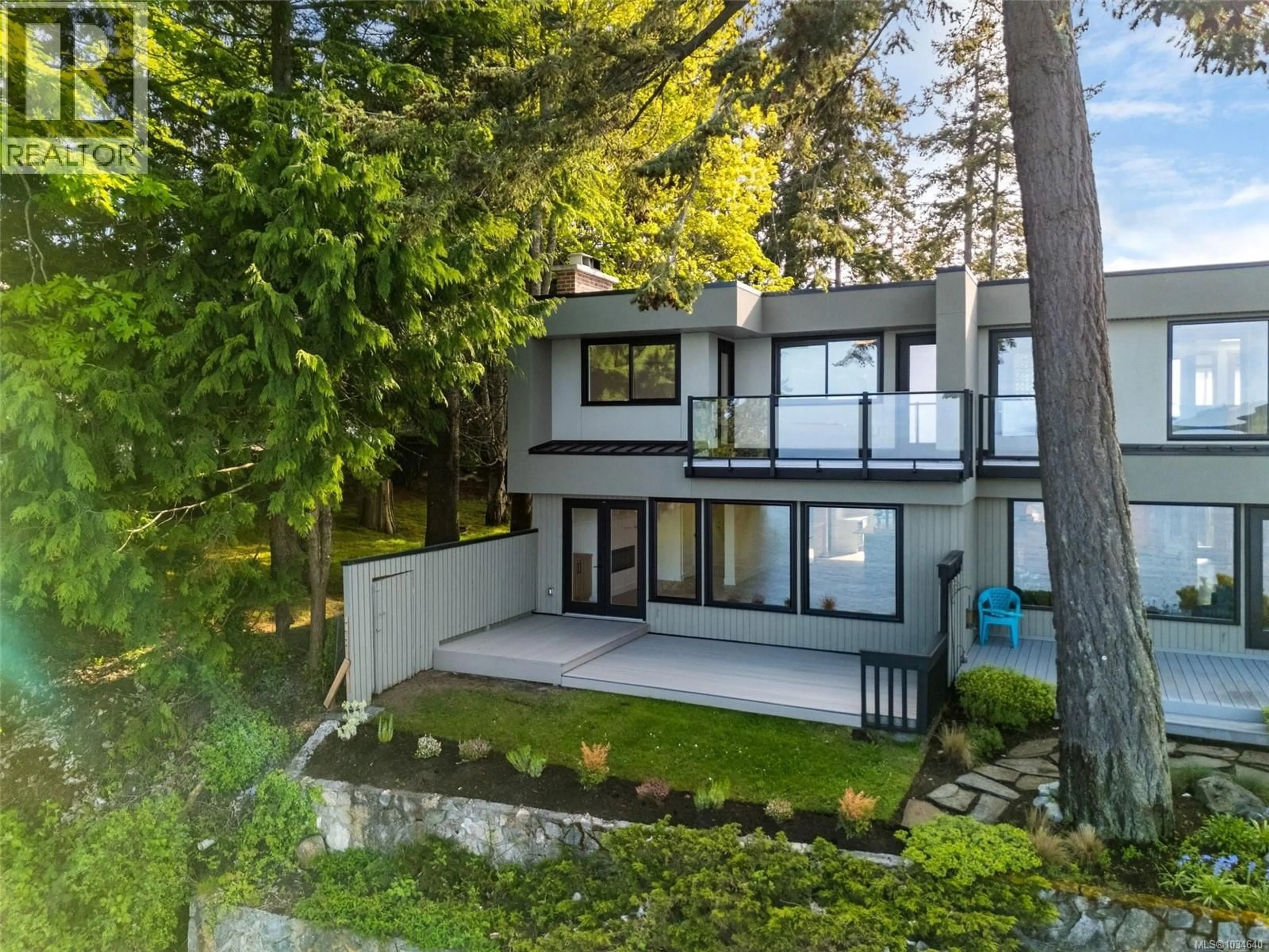 A pic from outside/outdoor area/front of a property/back of a property/a pic from drone, forest/trees view for 16 - 2330 HARBOUR ROAD, Sidney British Columbia V8L2P8