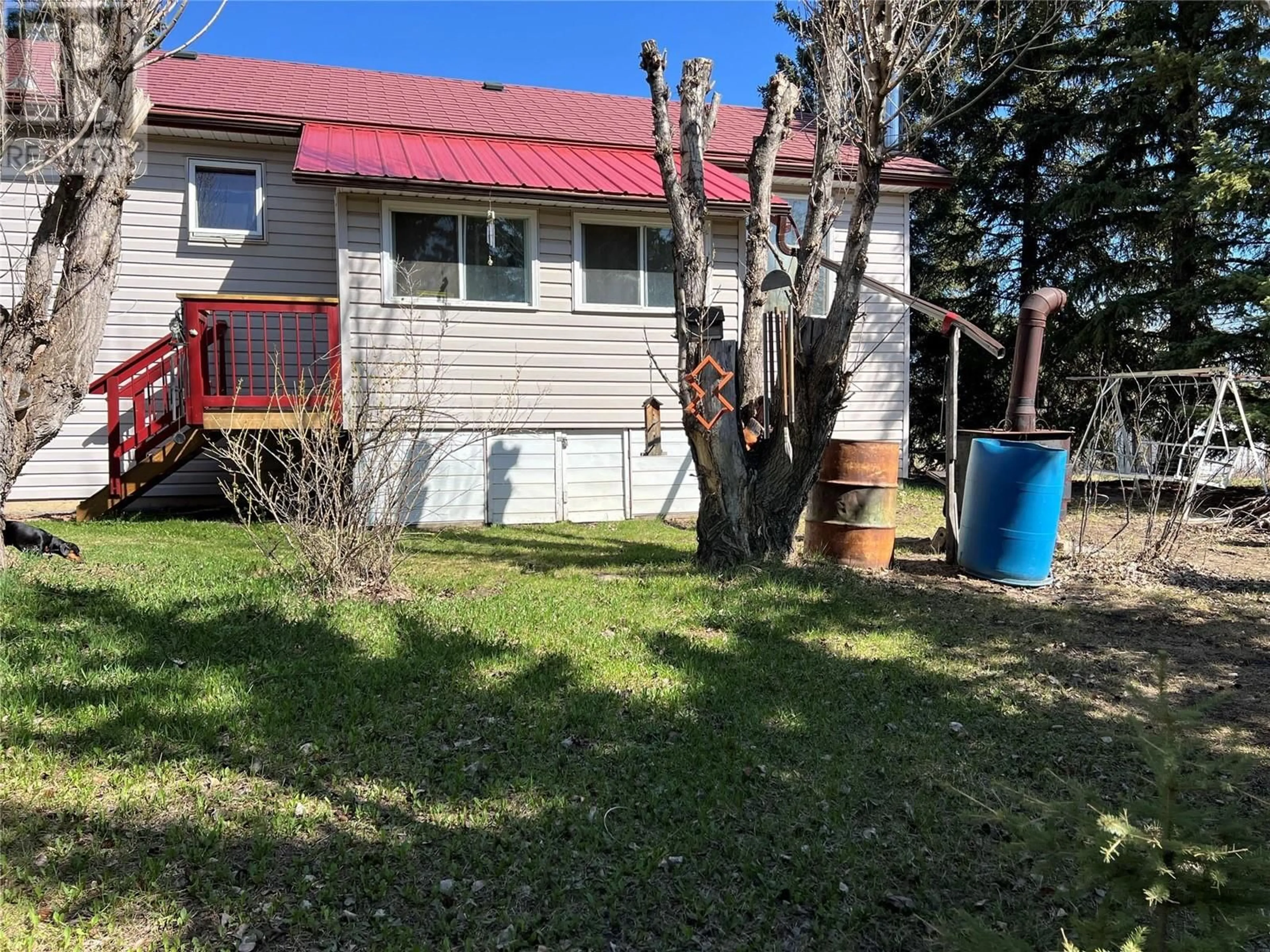 A pic from outside/outdoor area/front of a property/back of a property/a pic from drone, street for 2400 208 ROAD, Dawson Creek British Columbia V1G0B9