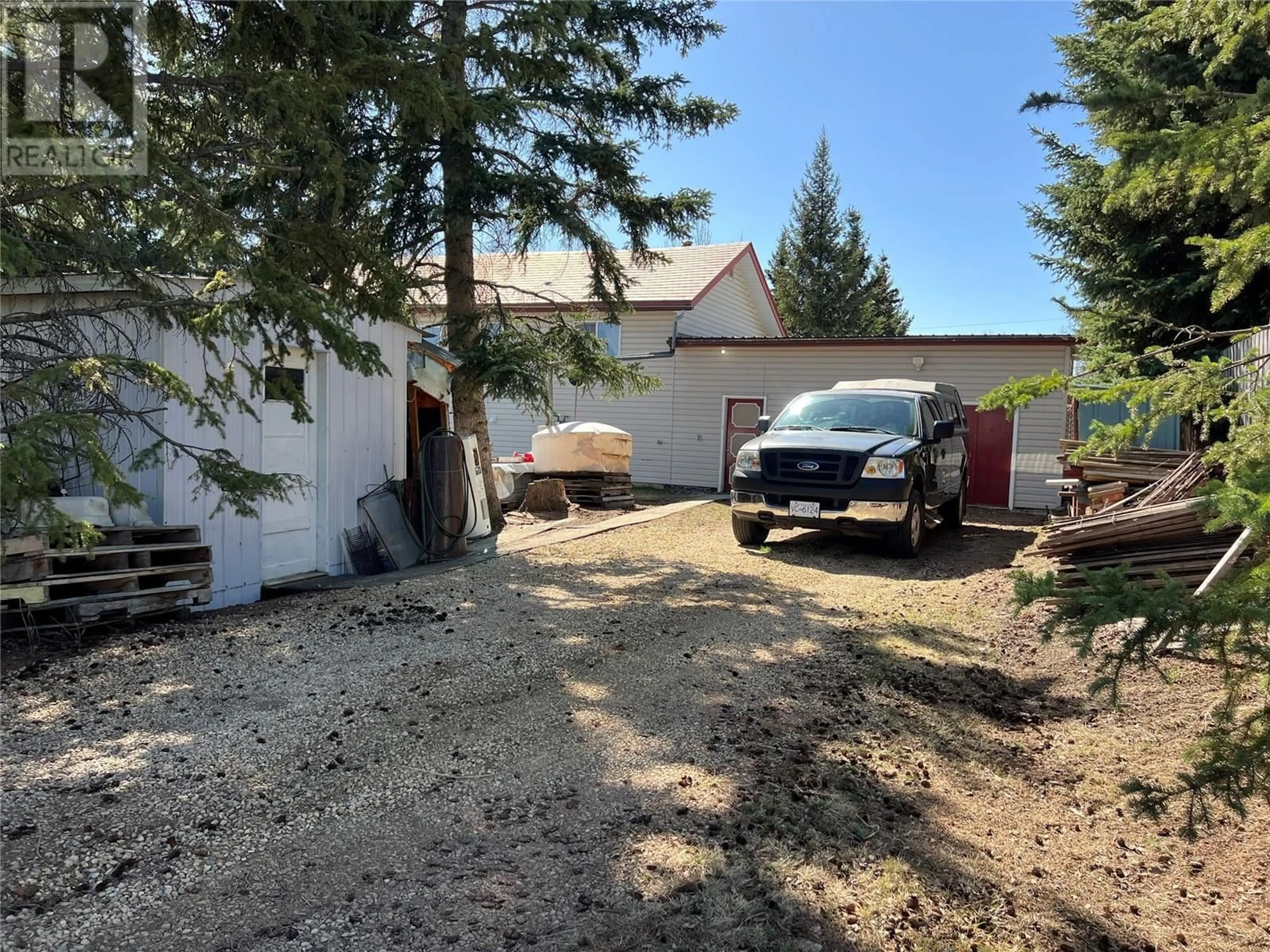 A pic from outside/outdoor area/front of a property/back of a property/a pic from drone, street for 2400 208 ROAD, Dawson Creek British Columbia V1G0B9