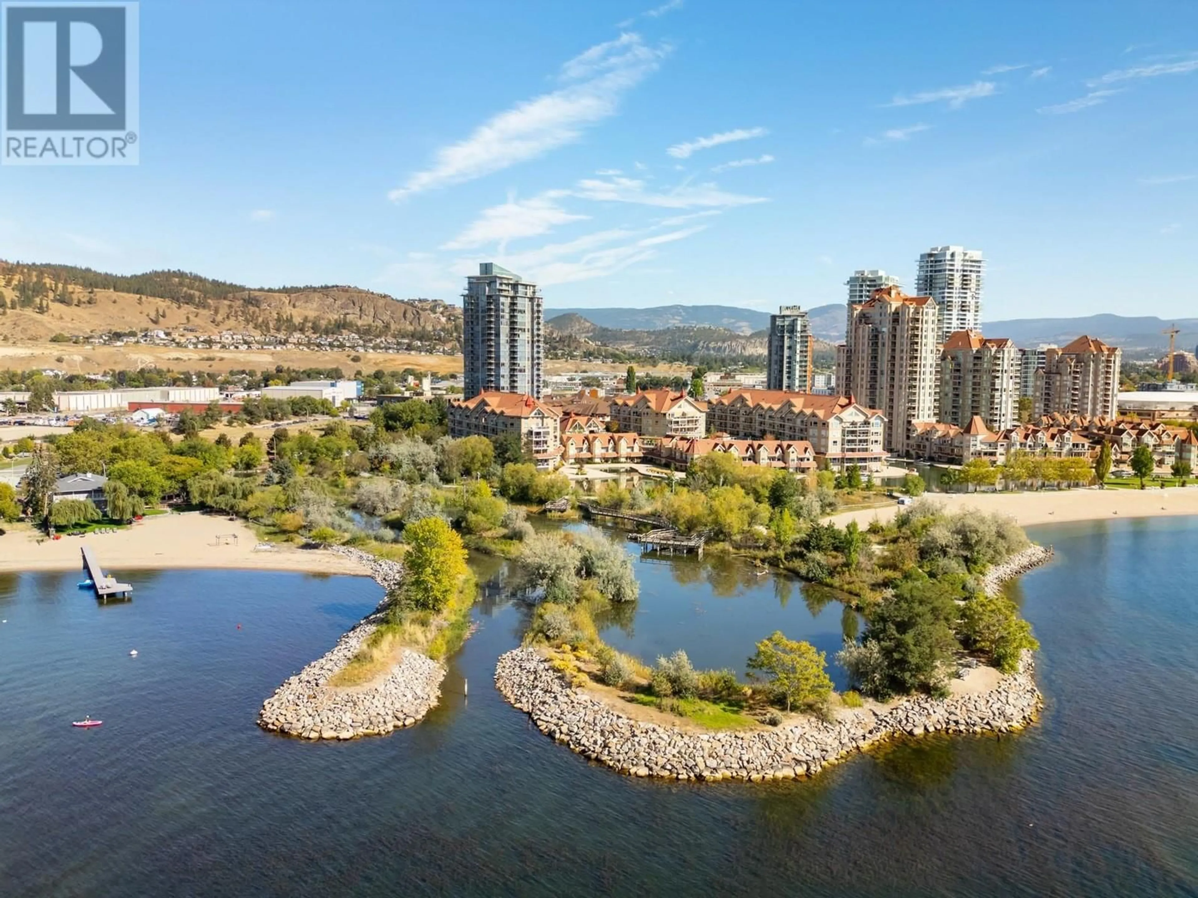 A pic from outside/outdoor area/front of a property/back of a property/a pic from drone, water/lake/river/ocean view for PH1 - 1075 SUNSET DRIVE, Kelowna British Columbia V1Y9Y9