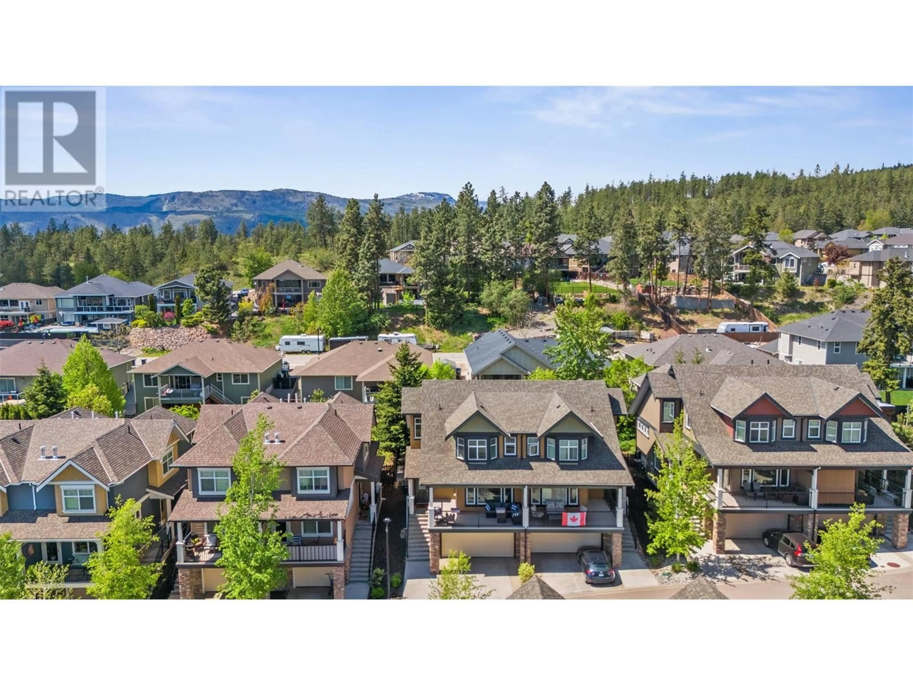 A pic from outside/outdoor area/front of a property/back of a property/a pic from drone, mountain view for 60 - 12850 STILLWATER COURT, Lake Country British Columbia V4V2S9