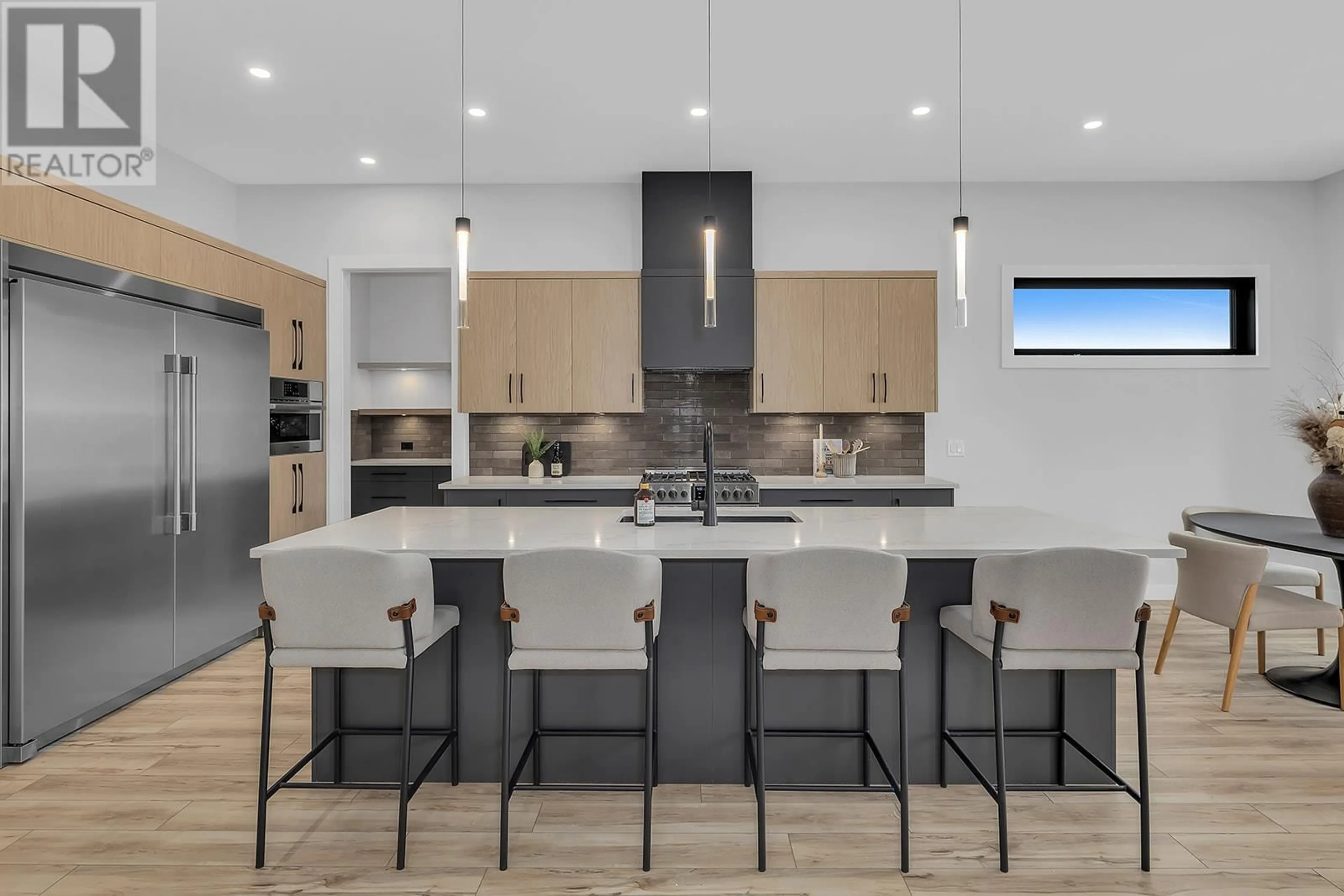 Open concept kitchen, ceramic/tile floor for 771 CARNOUSTIE DRIVE, Kelowna British Columbia V1P0A3