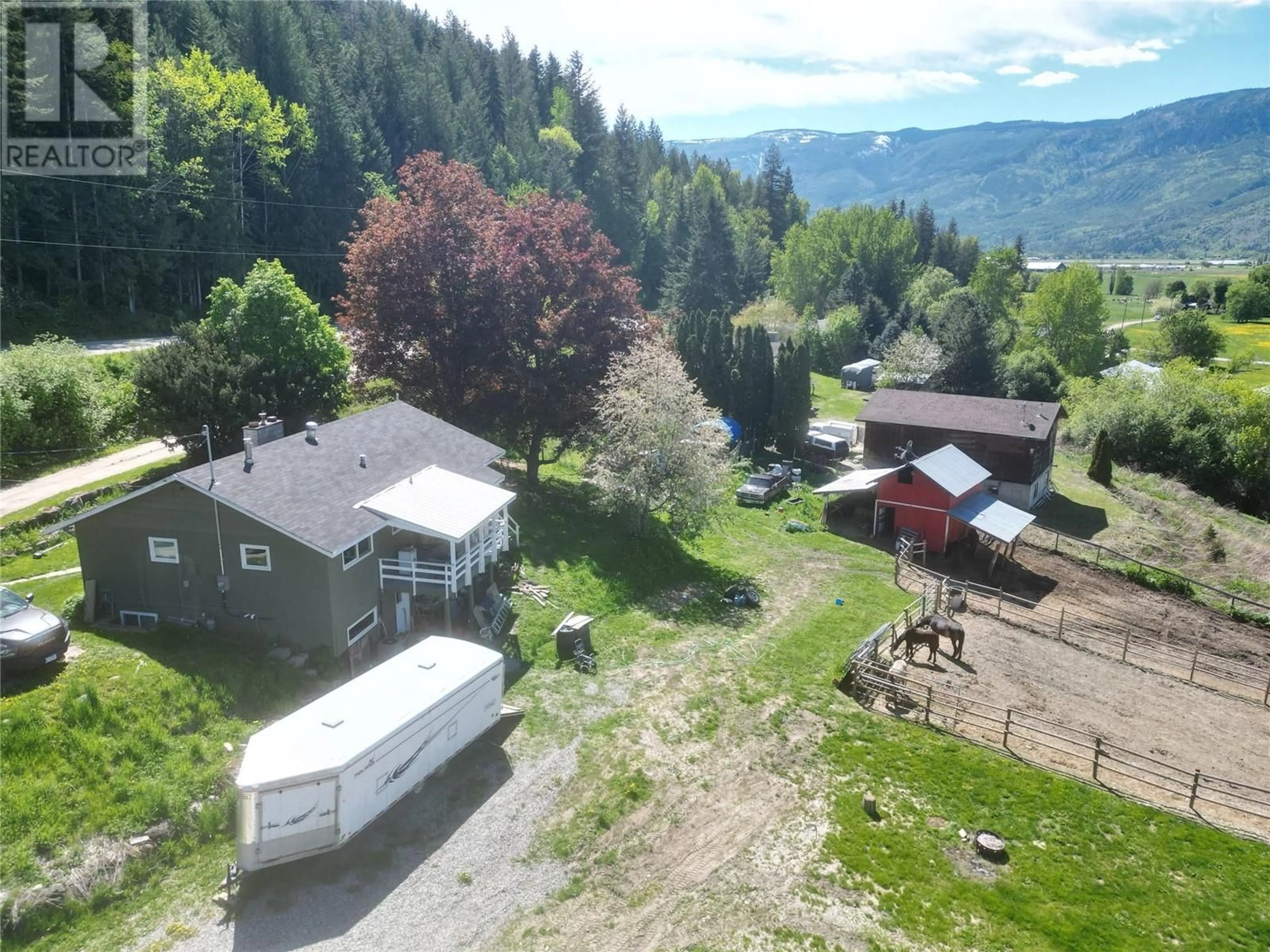 A pic from outside/outdoor area/front of a property/back of a property/a pic from drone, mountain view for 2651 FOOTHILL ROAD SOUTHWEST, Salmon Arm British Columbia V1E1L7