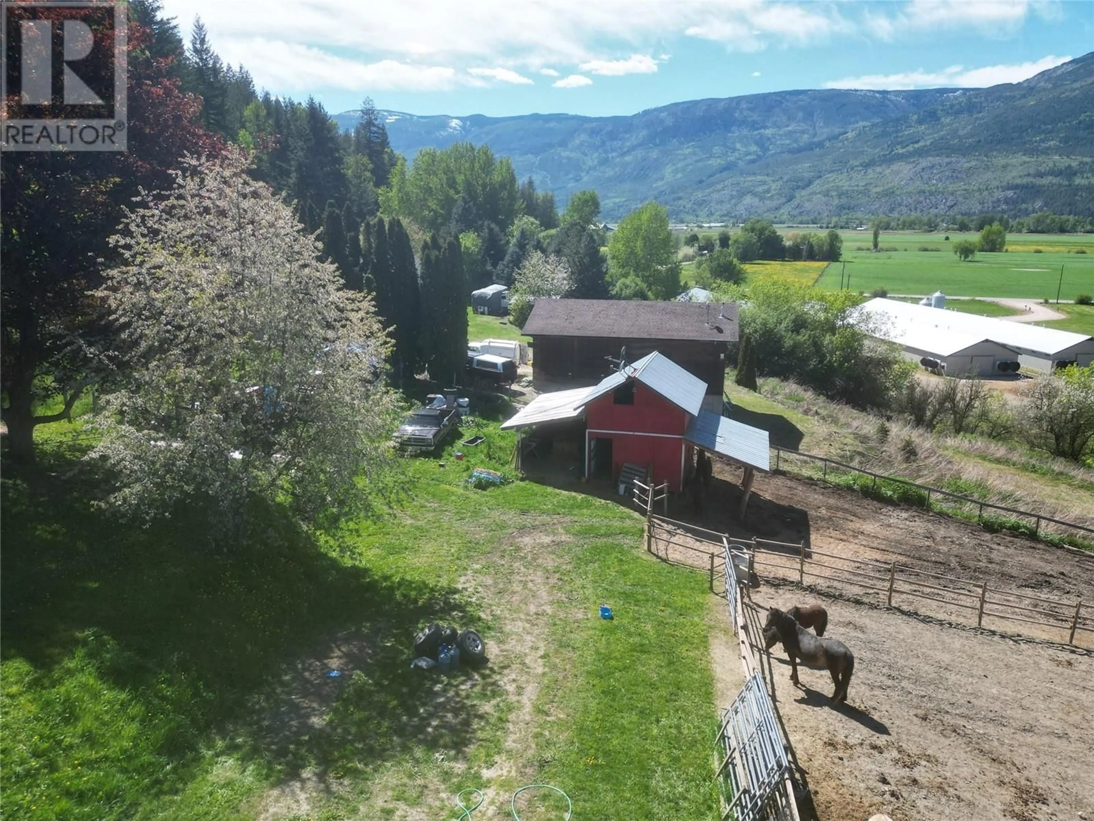 A pic from outside/outdoor area/front of a property/back of a property/a pic from drone, mountain view for 2651 FOOTHILL ROAD SOUTHWEST, Salmon Arm British Columbia V1E1L7