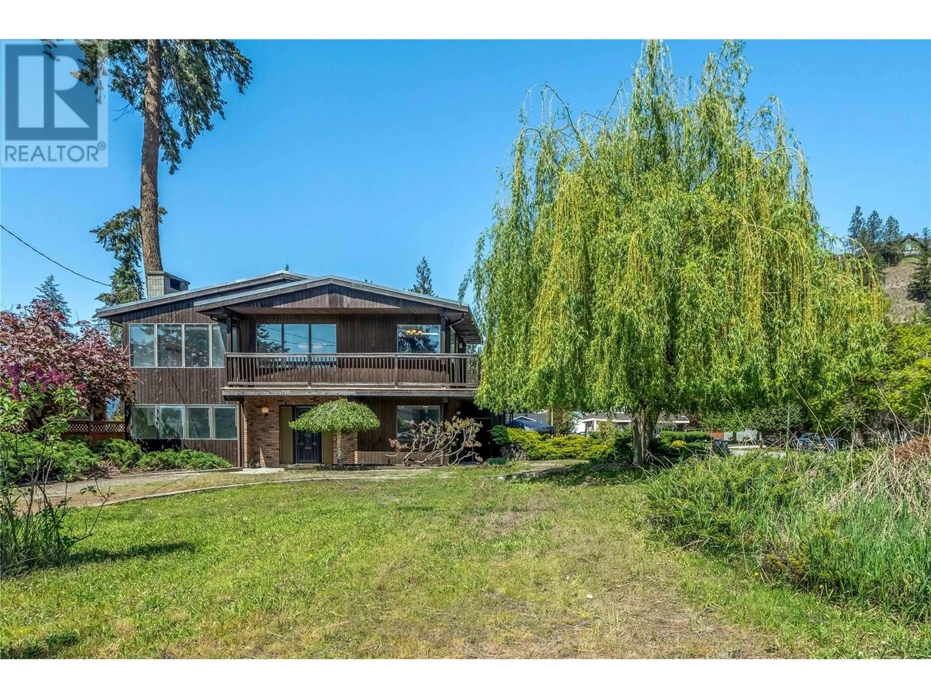 A pic from outside/outdoor area/front of a property/back of a property/a pic from drone, water/lake/river/ocean view for 770 RAYMER ROAD, Kelowna British Columbia V1W1H8