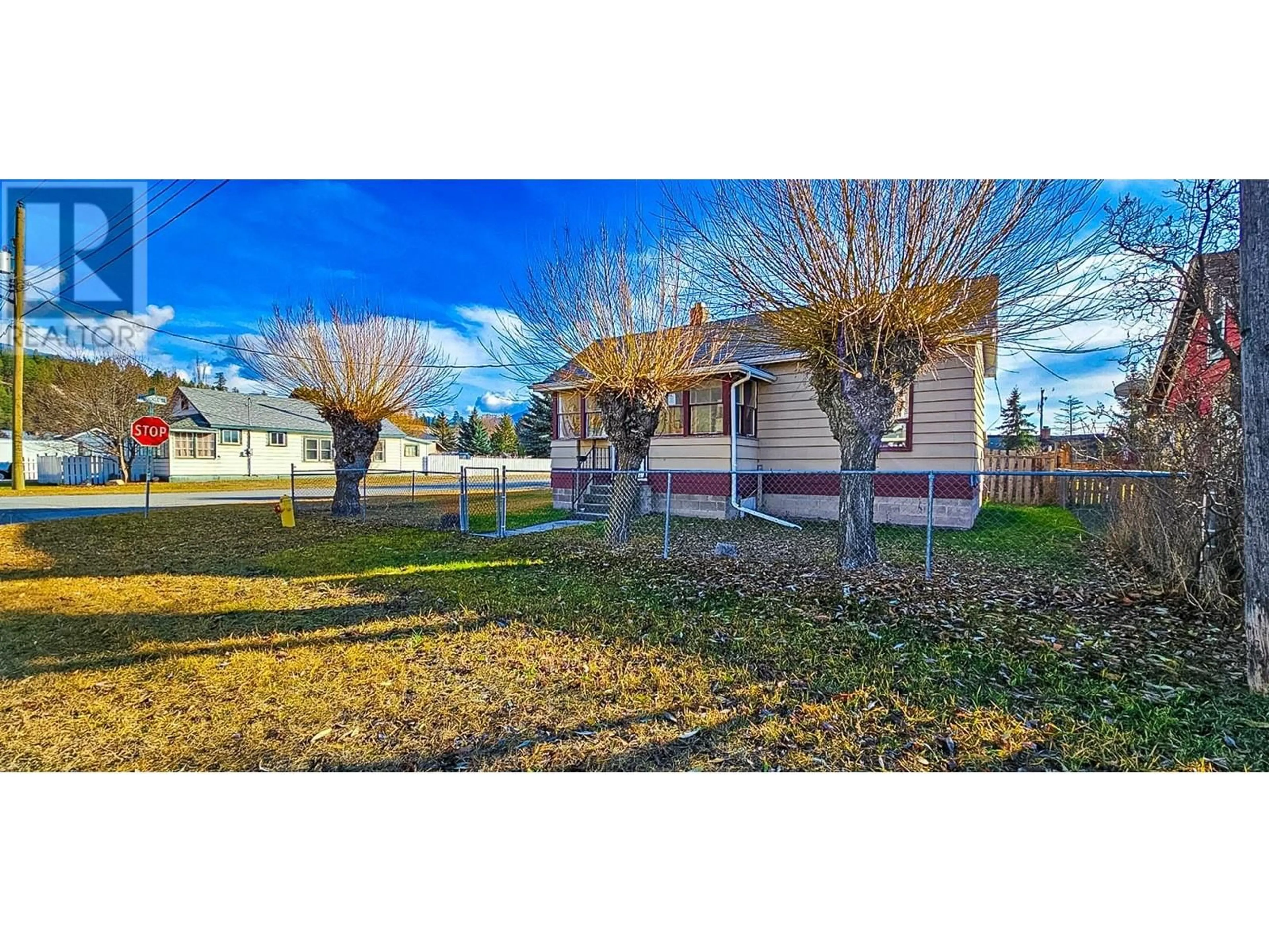 A pic from outside/outdoor area/front of a property/back of a property/a pic from drone, street for 4966 LUCK AVENUE, Canal Flats British Columbia V0B1B0