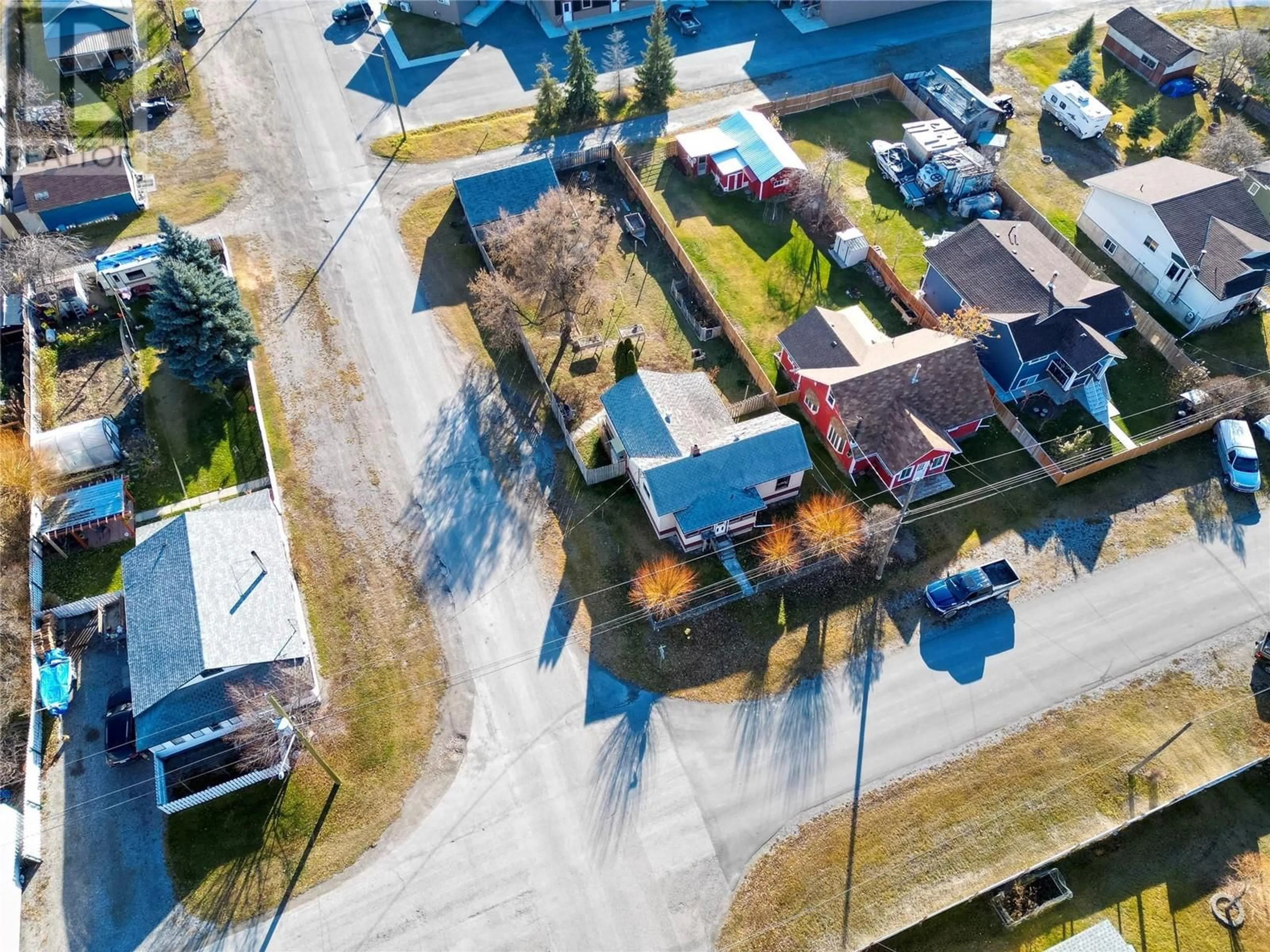 A pic from outside/outdoor area/front of a property/back of a property/a pic from drone, street for 4966 LUCK AVENUE, Canal Flats British Columbia V0B1B0