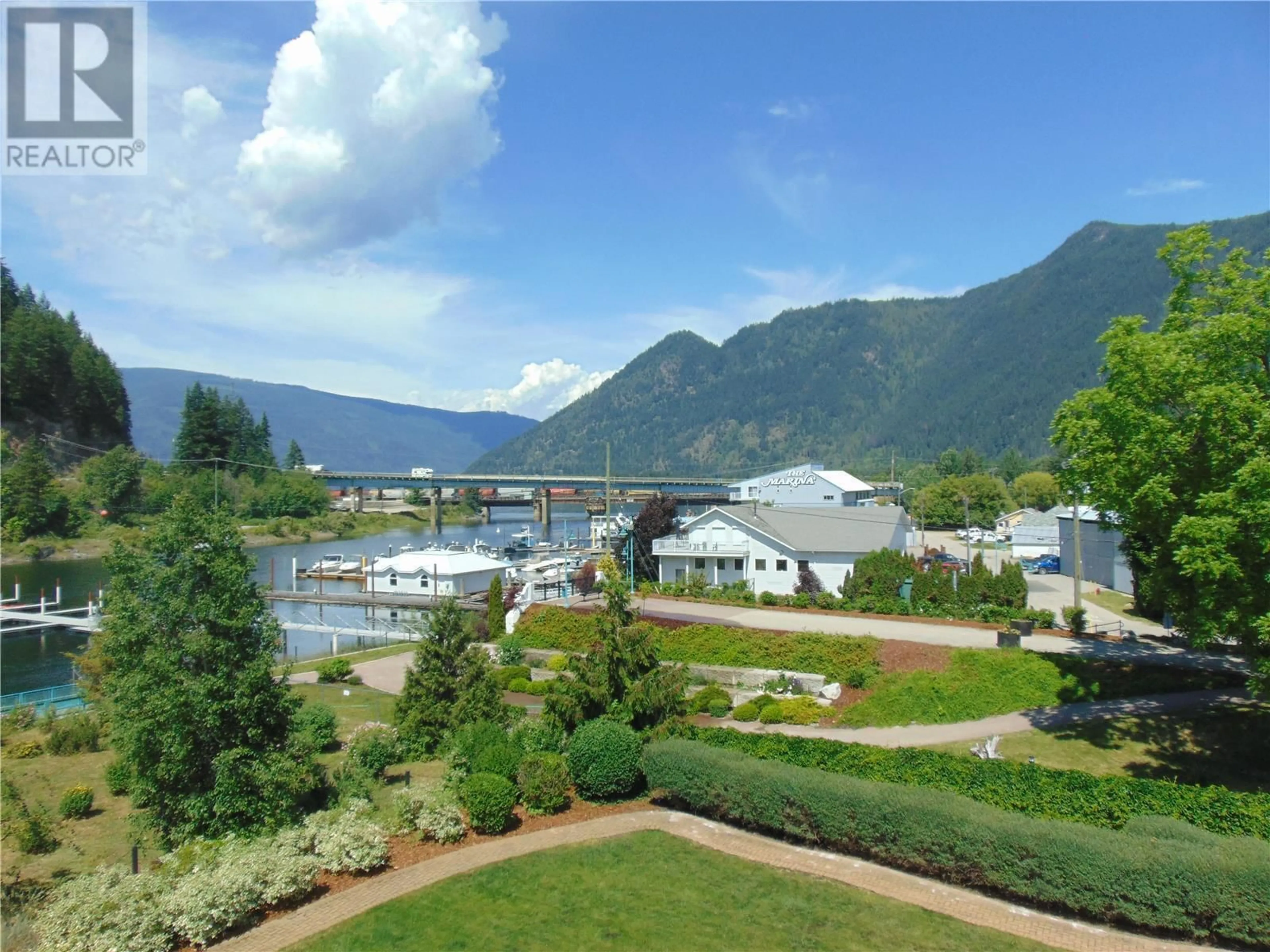 A pic from outside/outdoor area/front of a property/back of a property/a pic from drone, water/lake/river/ocean view for 30 - 1130 RIVERSIDE AVENUE, Sicamous British Columbia V0E2V1