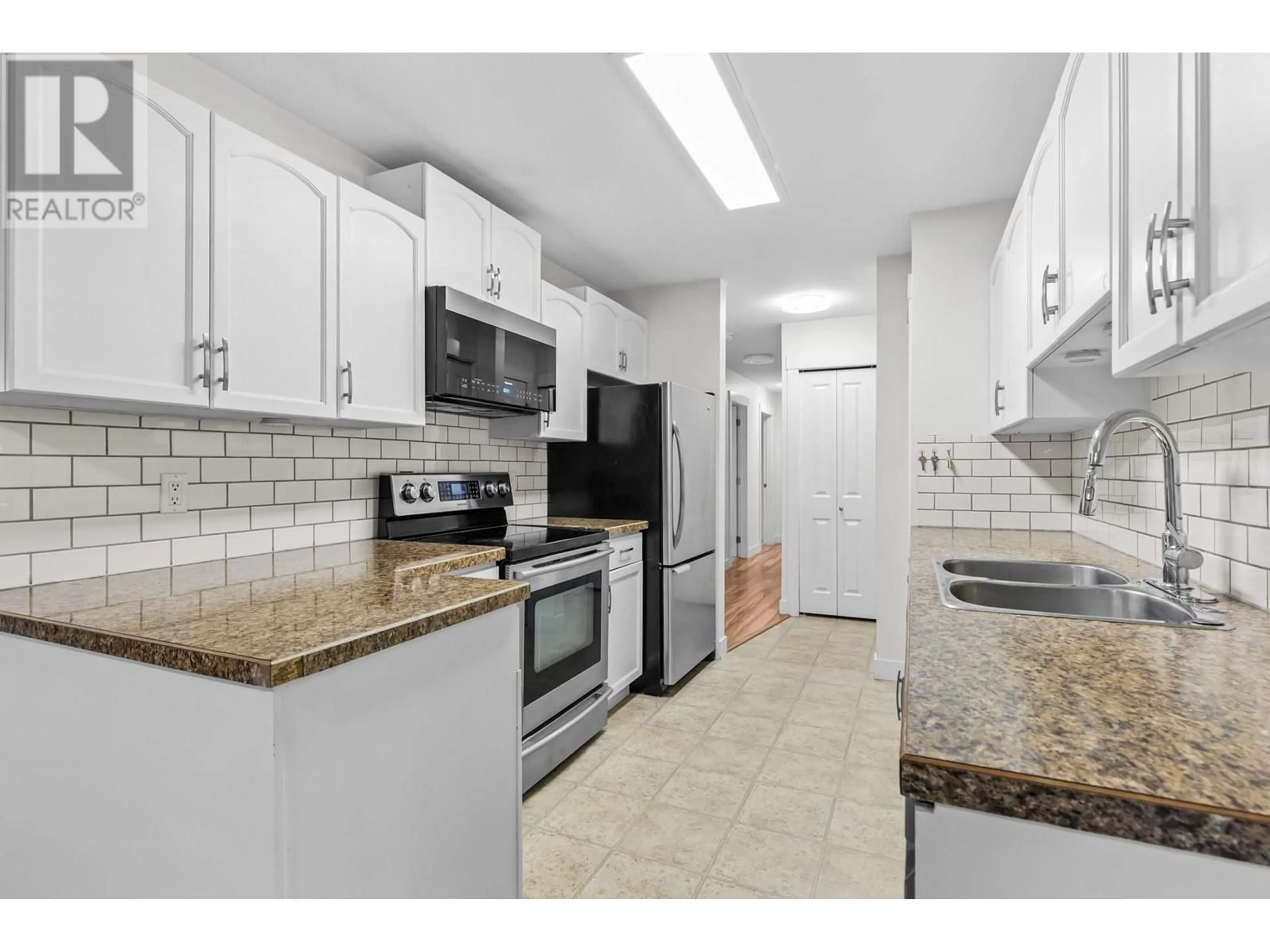 Standard kitchen, ceramic/tile floor for 263 - 3854 GORDON DRIVE, Kelowna British Columbia V1W3G5