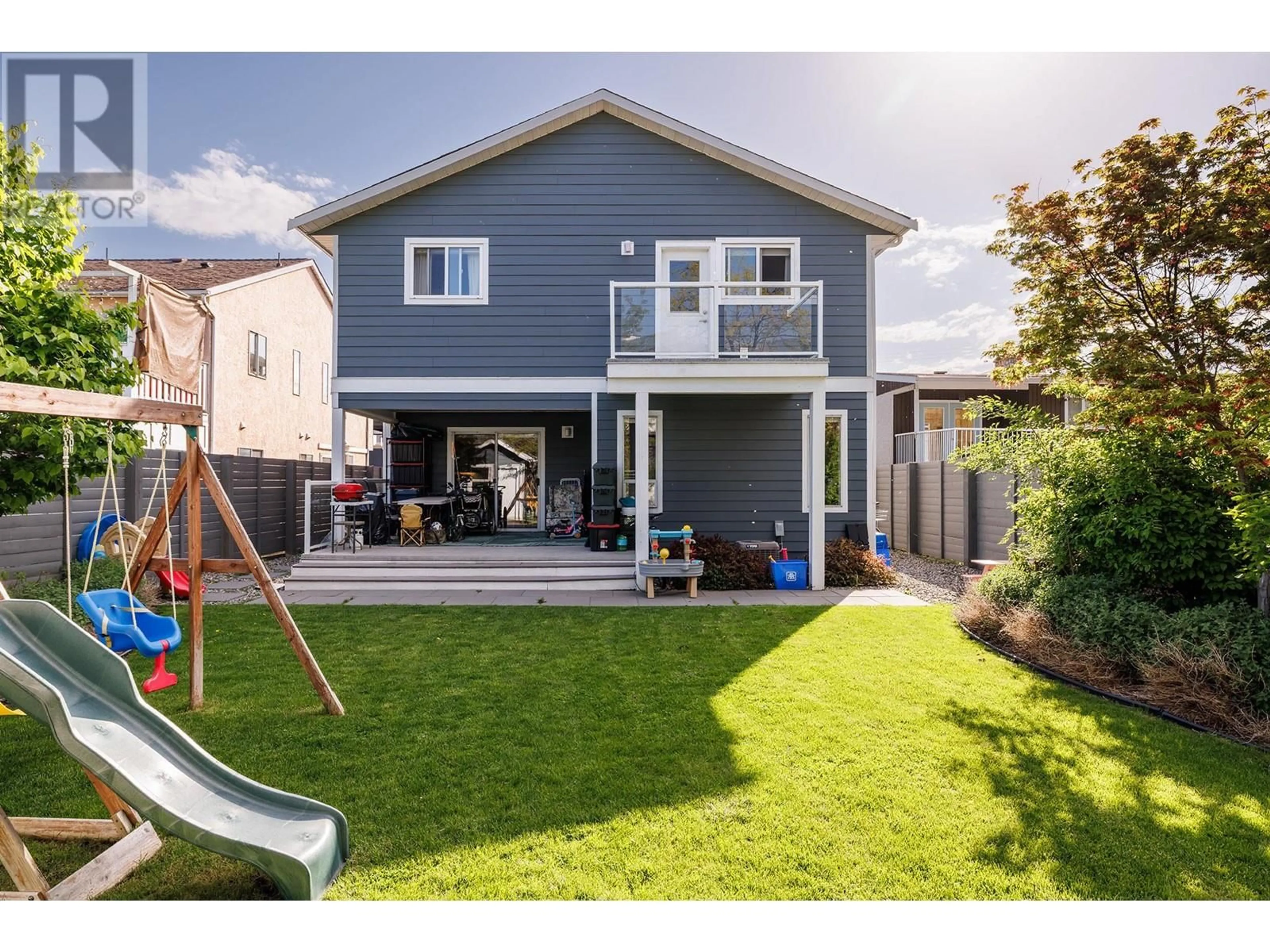 Home with vinyl exterior material, street for 969 MANHATTAN DRIVE, Kelowna British Columbia V1Y1H7