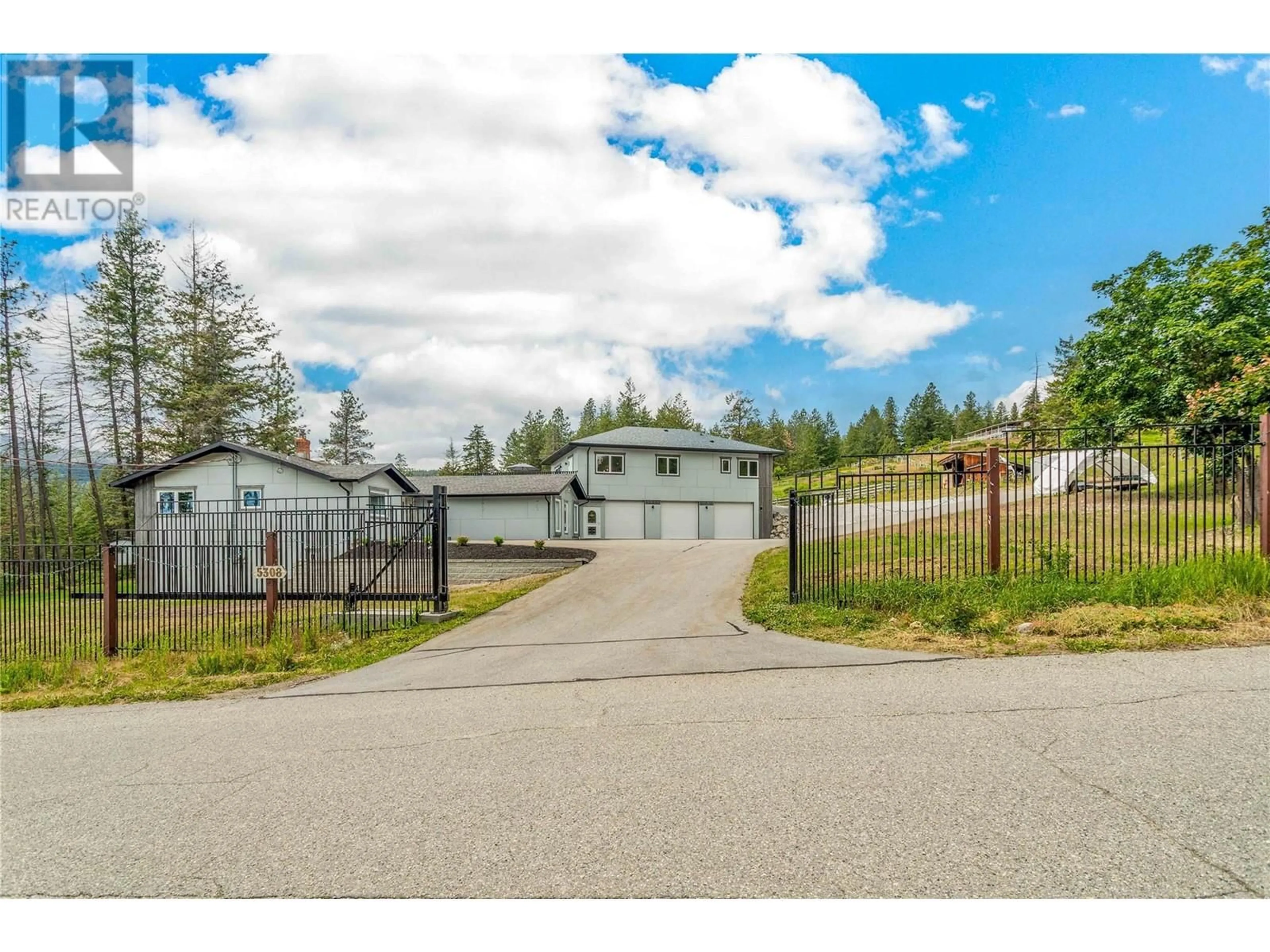 A pic from outside/outdoor area/front of a property/back of a property/a pic from drone, unknown for 5308 LAW STREET, Peachland British Columbia V0H1X8