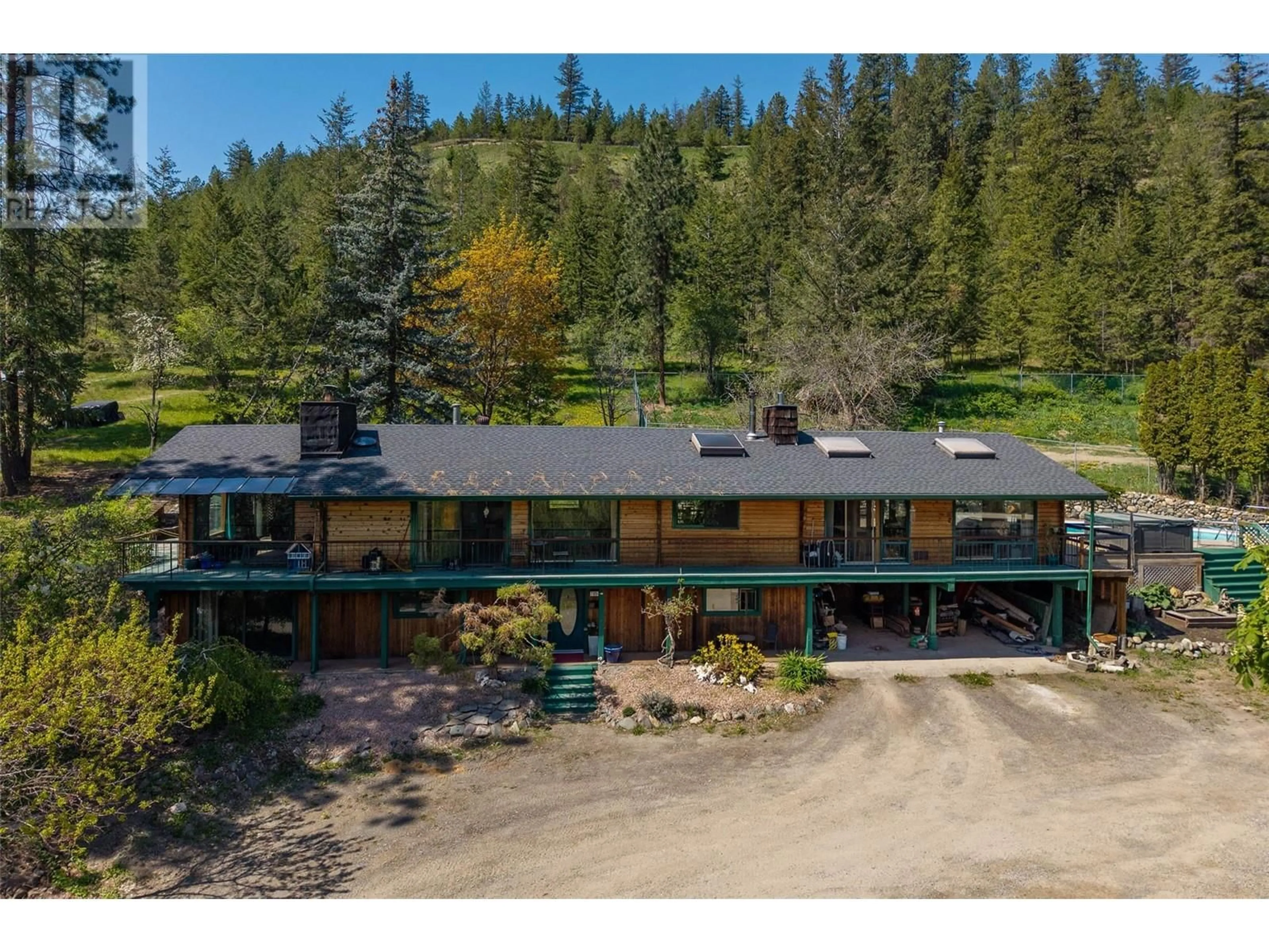 A pic from outside/outdoor area/front of a property/back of a property/a pic from drone, unknown for 7050 WESTSYDE ROAD, Kamloops British Columbia V2C1Z3