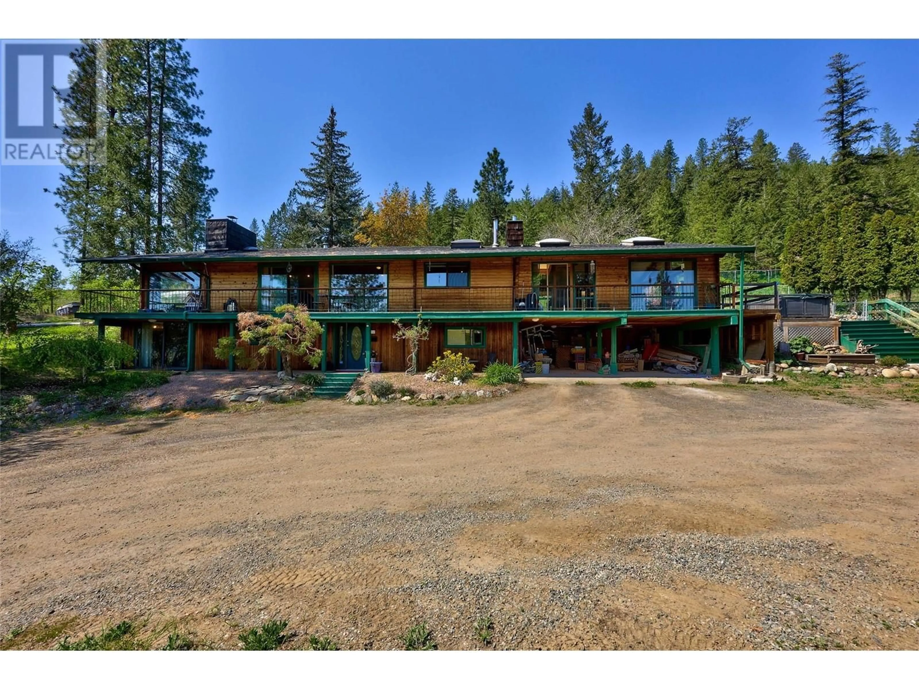 A pic from outside/outdoor area/front of a property/back of a property/a pic from drone, unknown for 7050 WESTSYDE ROAD, Kamloops British Columbia V2C1Z3