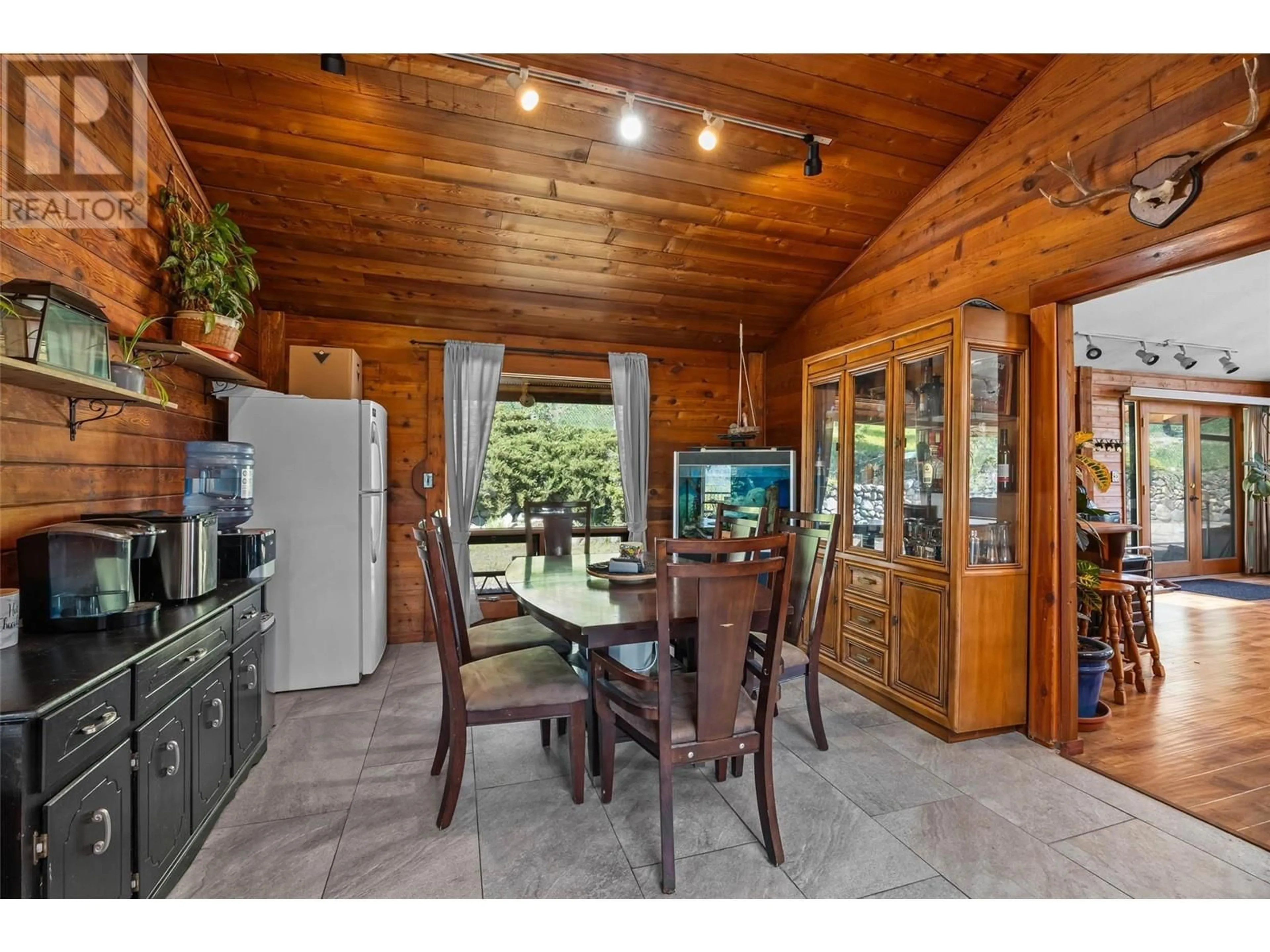 Open concept kitchen, wood/laminate floor for 7050 WESTSYDE ROAD, Kamloops British Columbia V2C1Z3