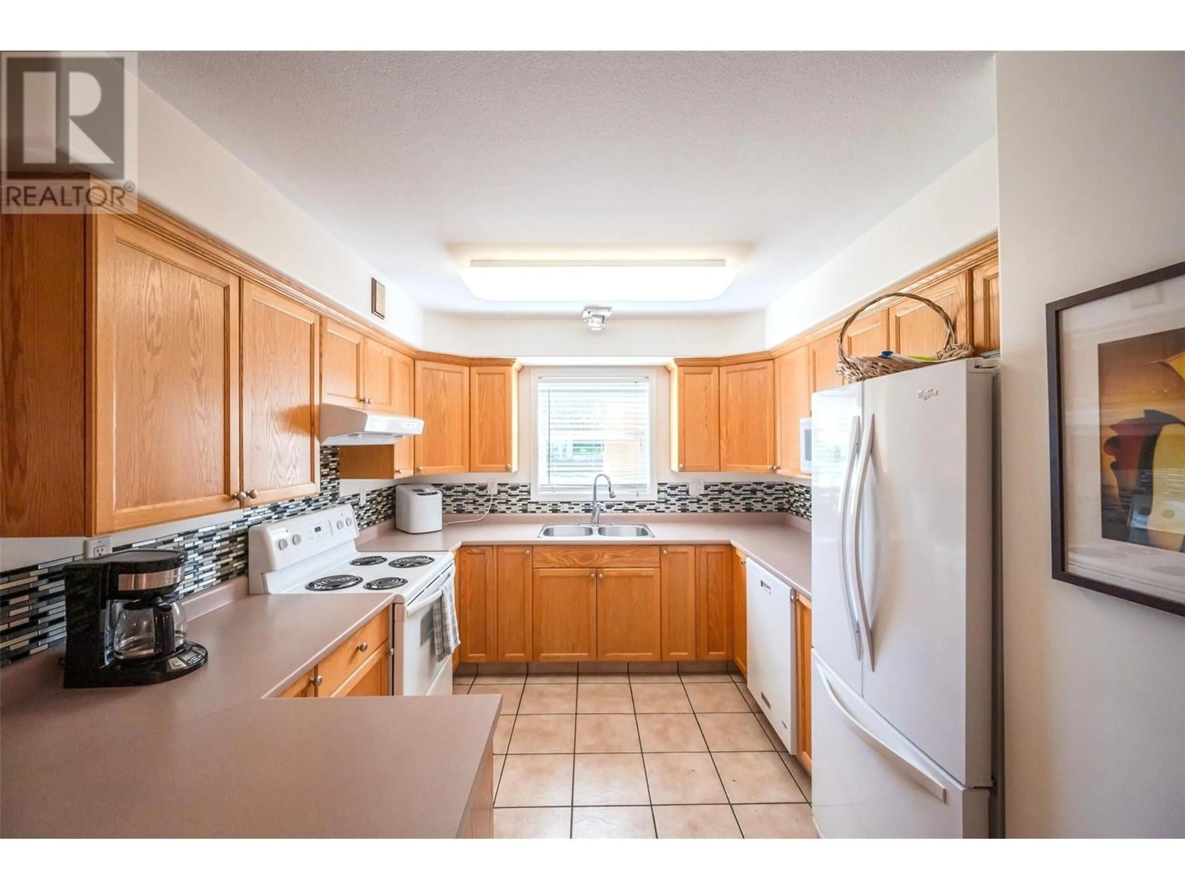 Standard kitchen, ceramic/tile floor for 116 - 9307 62ND AVENUE, Osoyoos British Columbia V0H1V1