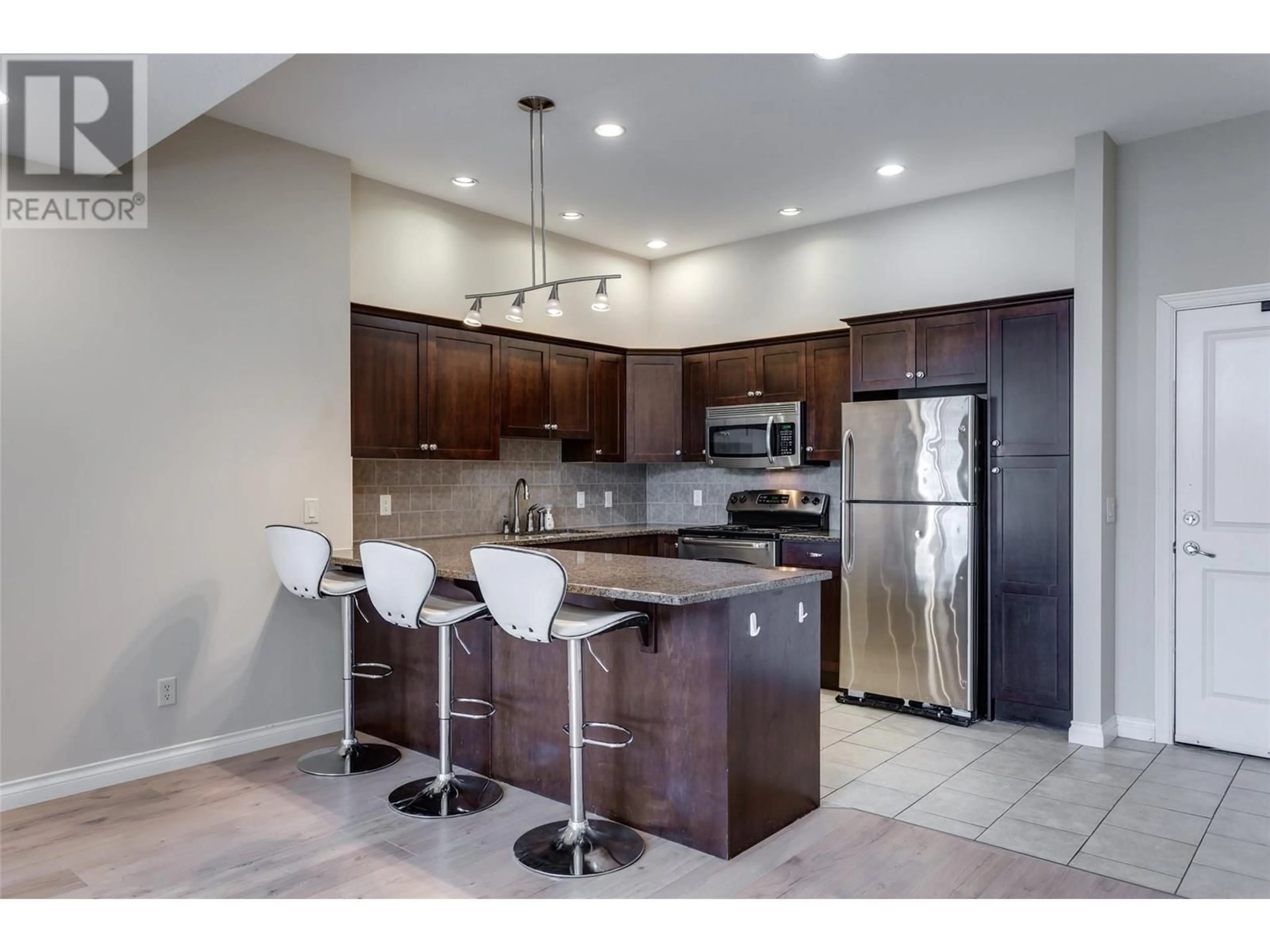 Open concept kitchen, ceramic/tile floor for 1403 - 3833 BROWN ROAD, West Kelowna British Columbia V4T2J3