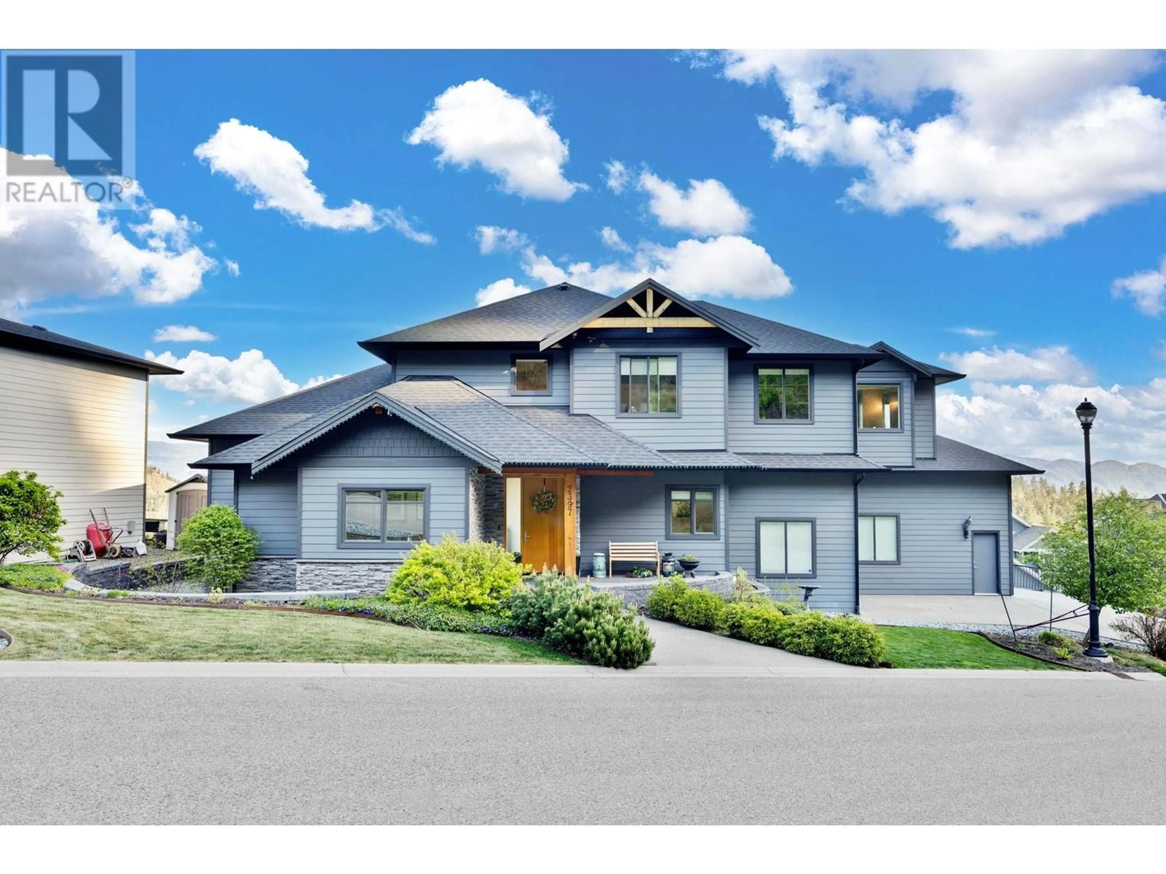 Home with vinyl exterior material, street for 2397 BIG SKY DRIVE, West Kelowna British Columbia V4T3M2