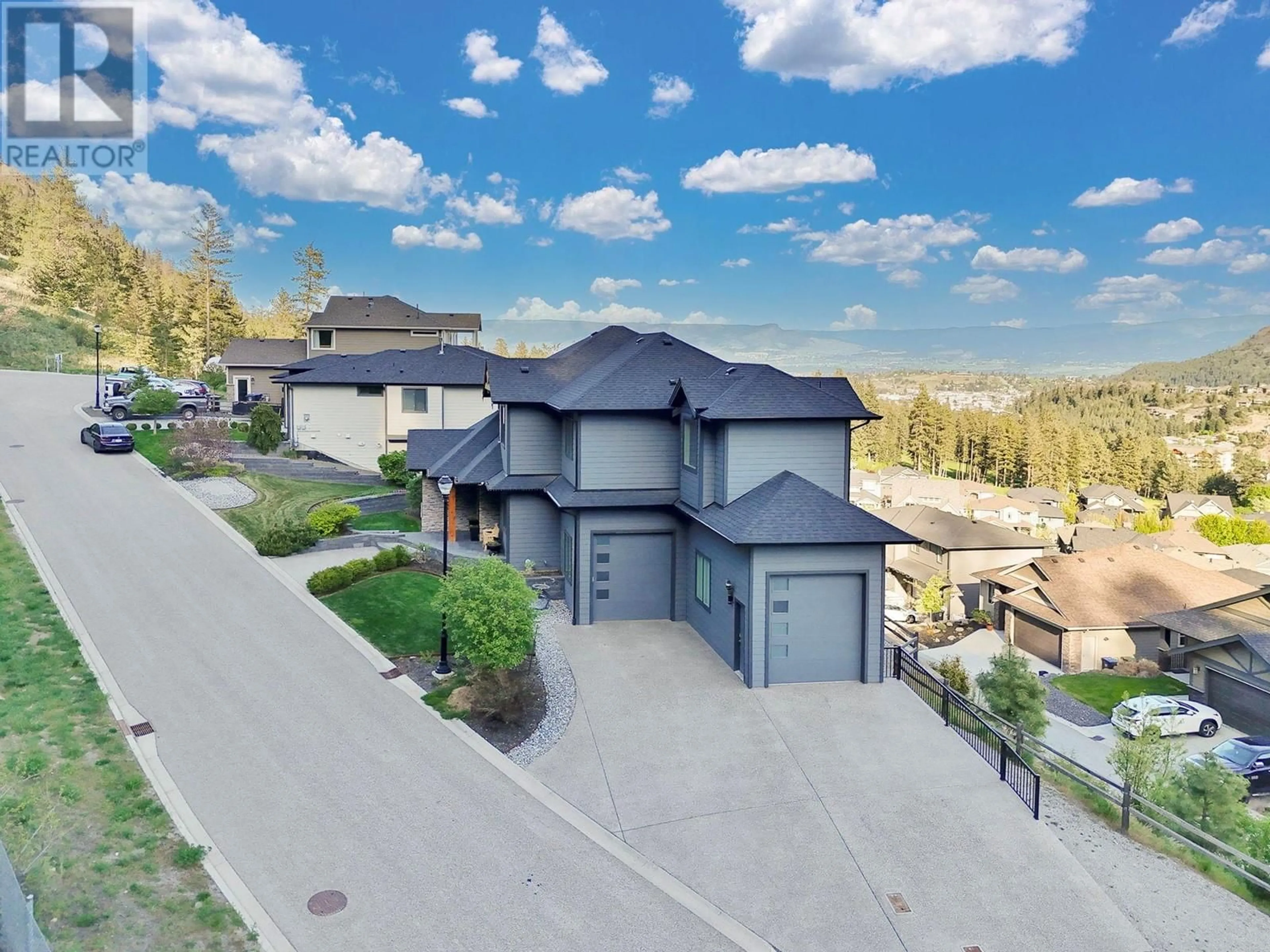 A pic from outside/outdoor area/front of a property/back of a property/a pic from drone, unknown for 2397 BIG SKY DRIVE, West Kelowna British Columbia V4T3M2