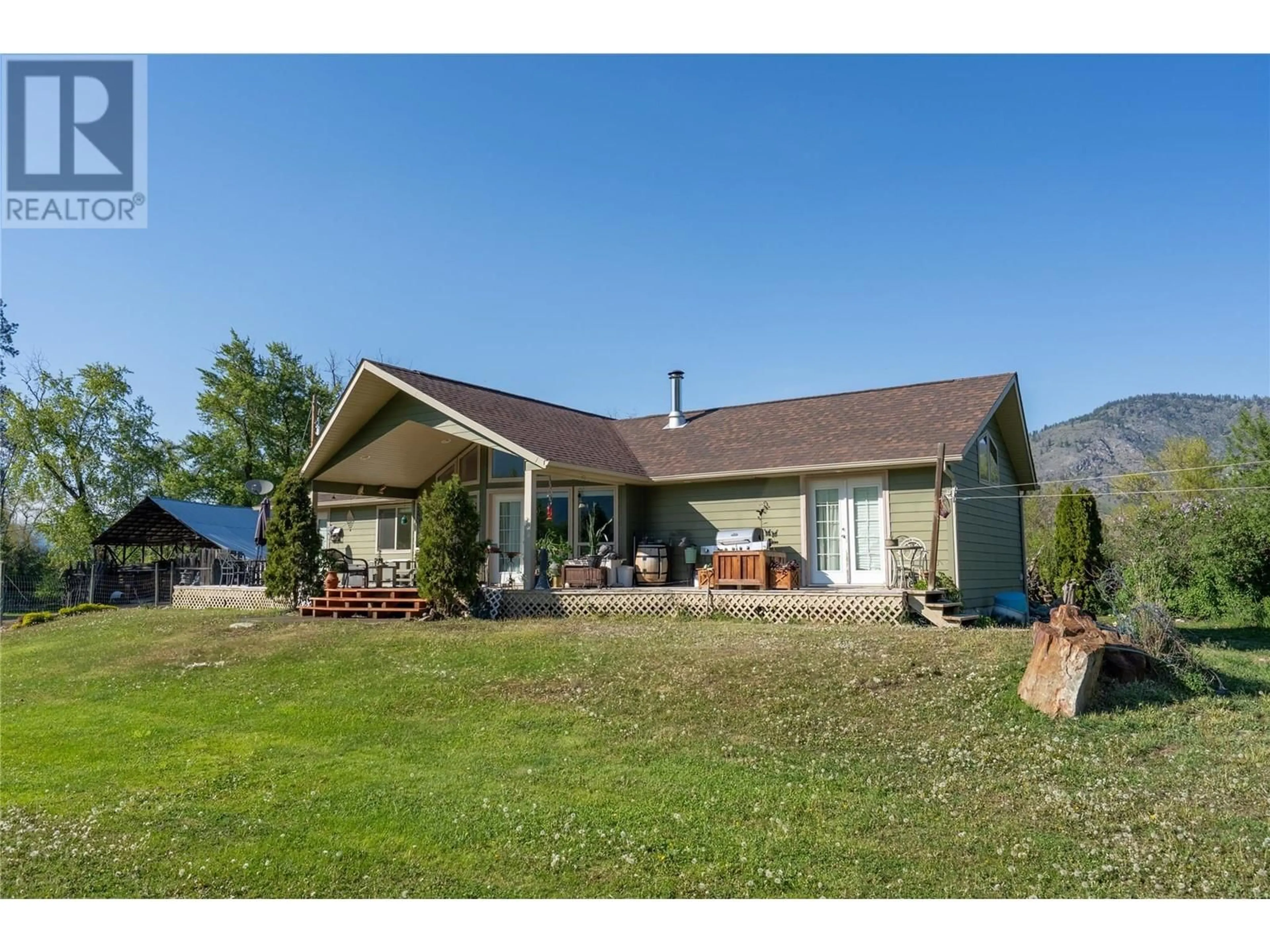 A pic from outside/outdoor area/front of a property/back of a property/a pic from drone, water/lake/river/ocean view for 299 ANTIFAEV ROAD, Grand Forks British Columbia V0H1H9