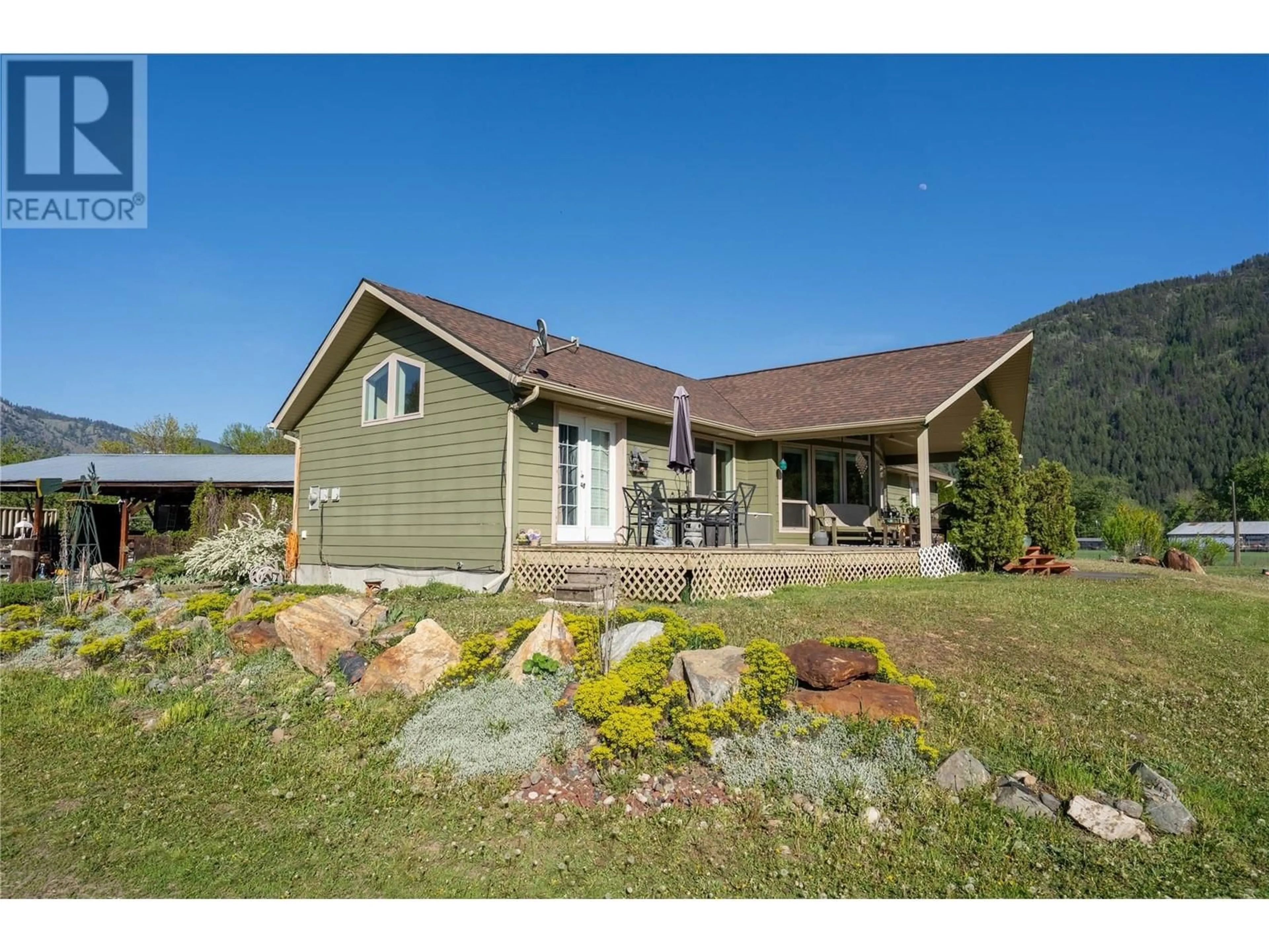 A pic from outside/outdoor area/front of a property/back of a property/a pic from drone, unknown for 299 ANTIFAEV ROAD, Grand Forks British Columbia V0H1H9