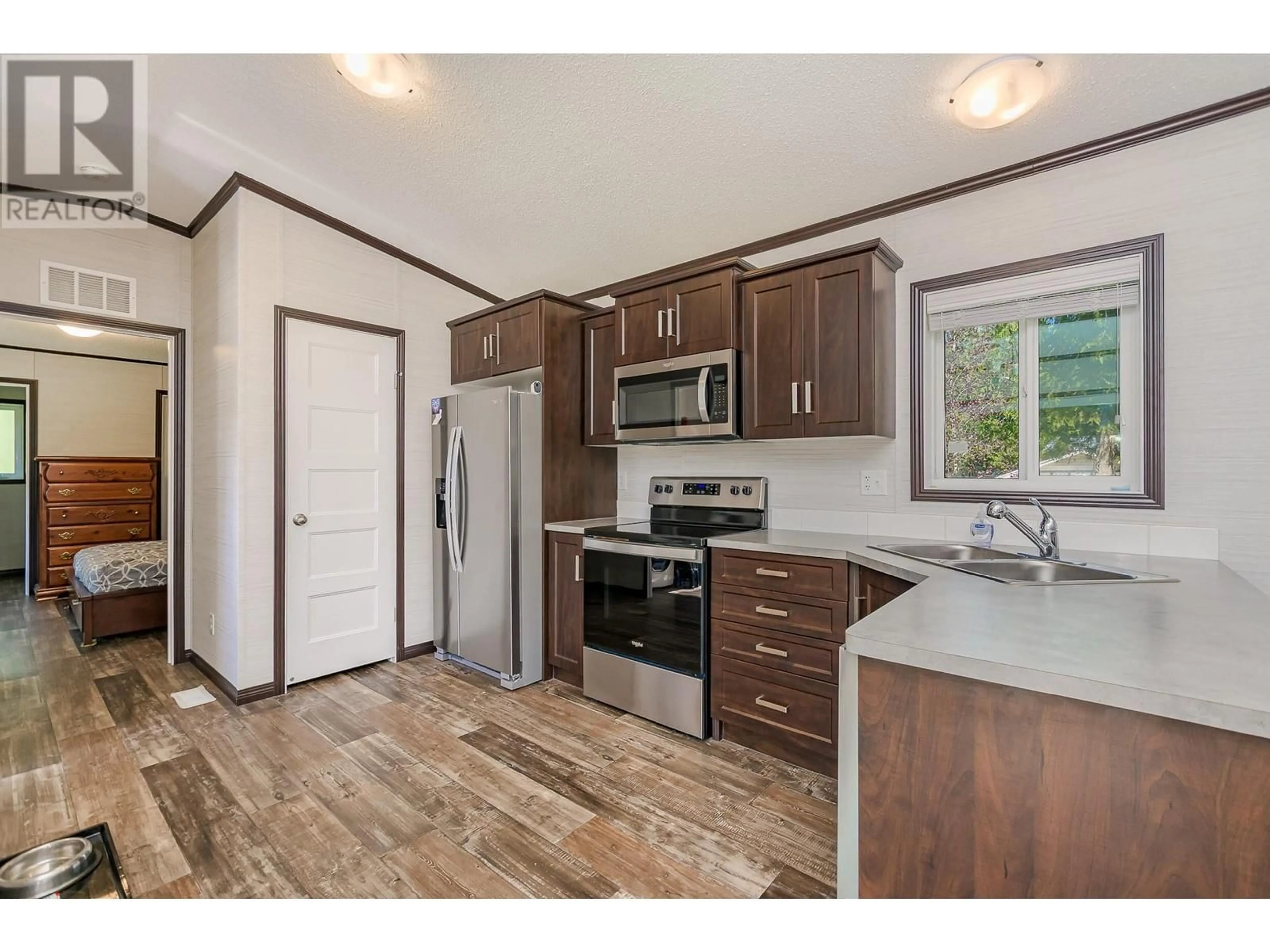 Standard kitchen, wood/laminate floor for 3997 MALAKWA ROAD, Malakwa British Columbia V0E2J0
