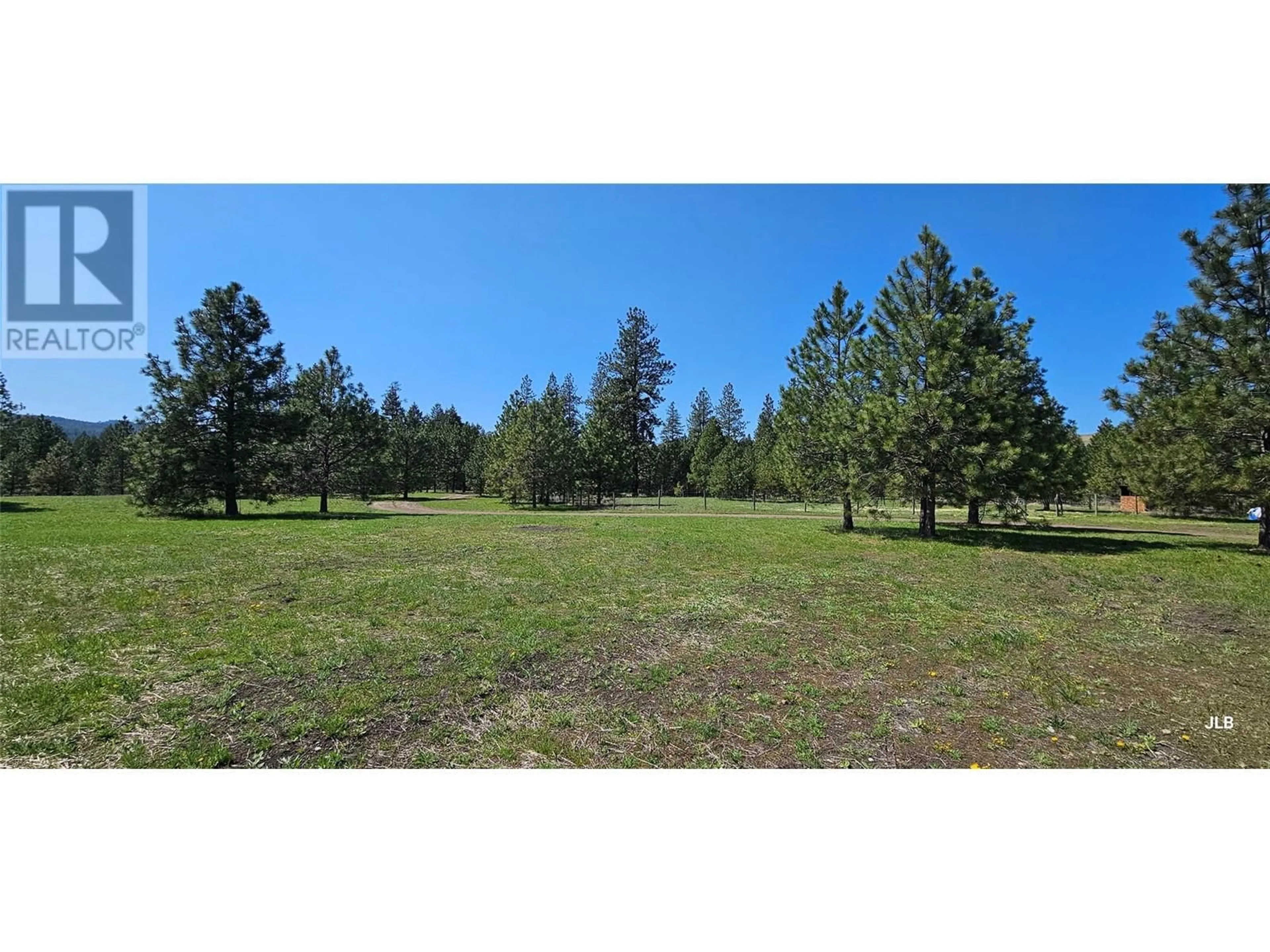 A pic from outside/outdoor area/front of a property/back of a property/a pic from drone, forest/trees view for 4755 JOHNSTONE CREEK CAMP ROAD, Rock Creek British Columbia V0H1Y0