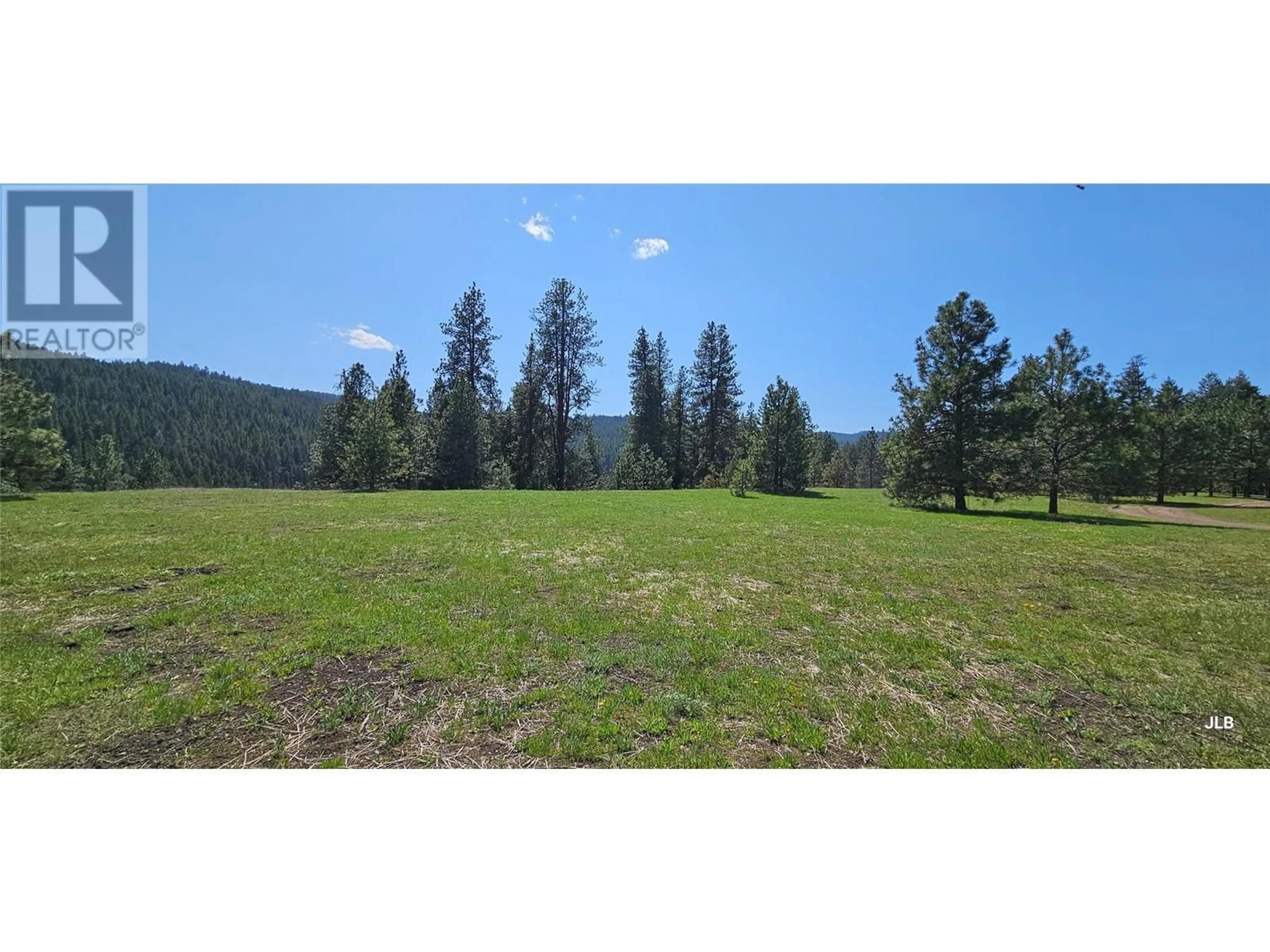 A pic from outside/outdoor area/front of a property/back of a property/a pic from drone, forest/trees view for 4755 JOHNSTONE CREEK CAMP ROAD, Rock Creek British Columbia V0H1Y0