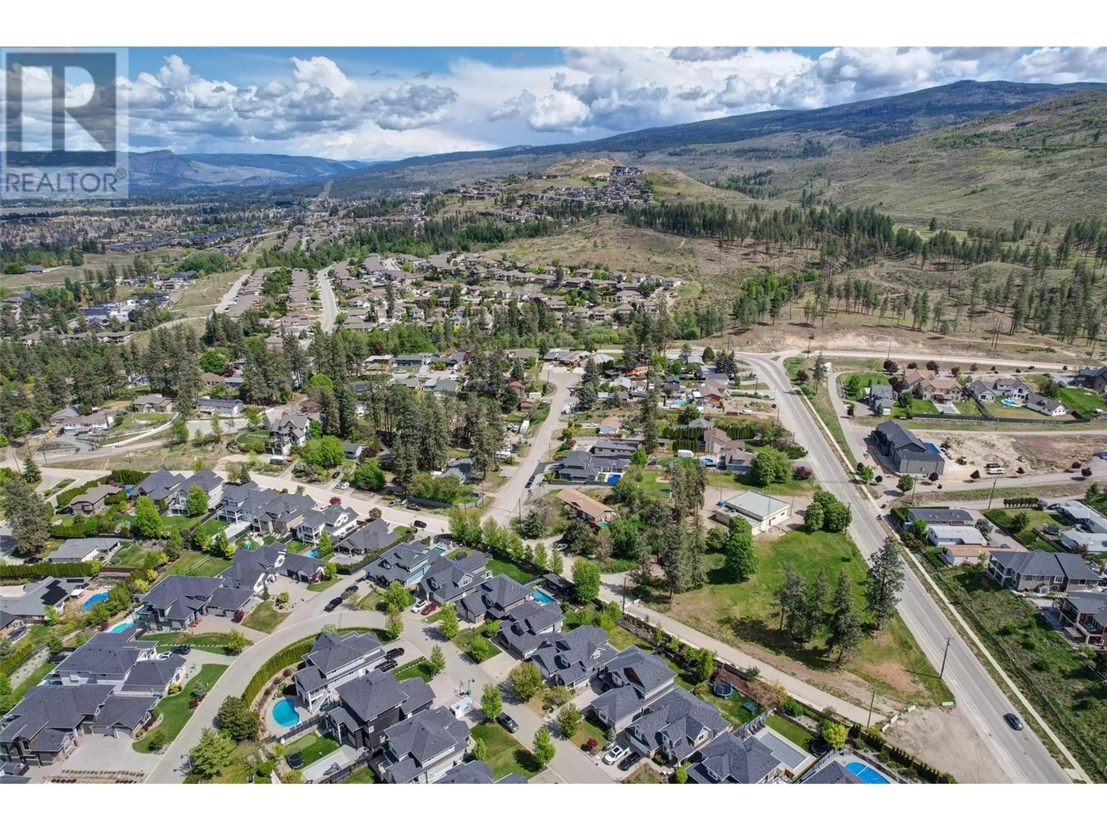 A pic from outside/outdoor area/front of a property/back of a property/a pic from drone, mountain view for 141 - 515 WREN PLACE, Kelowna British Columbia V1W5H7