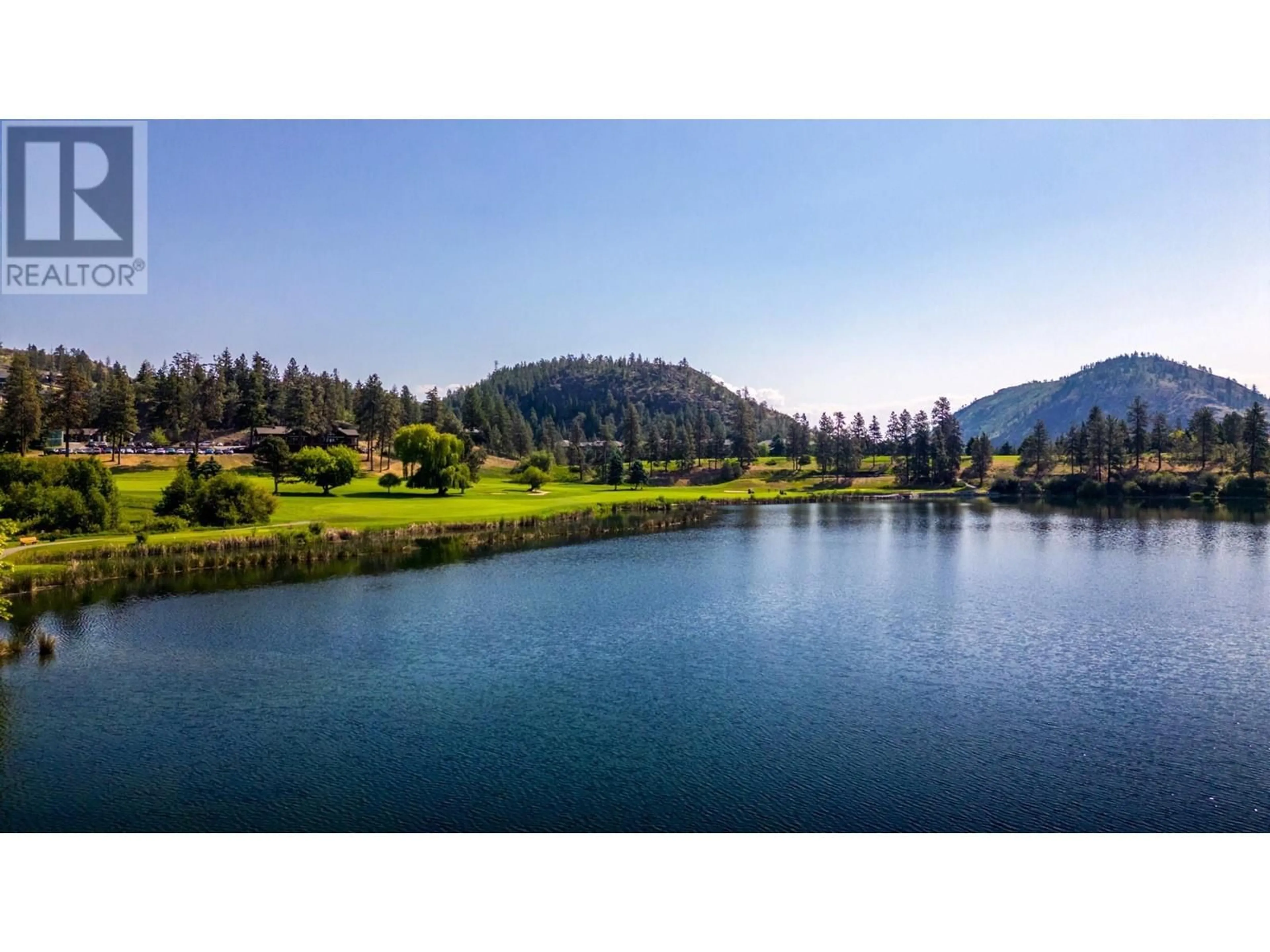 A pic from outside/outdoor area/front of a property/back of a property/a pic from drone, water/lake/river/ocean view for 502 - 2735 SHANNON LAKE ROAD, West Kelowna British Columbia V4T1V6